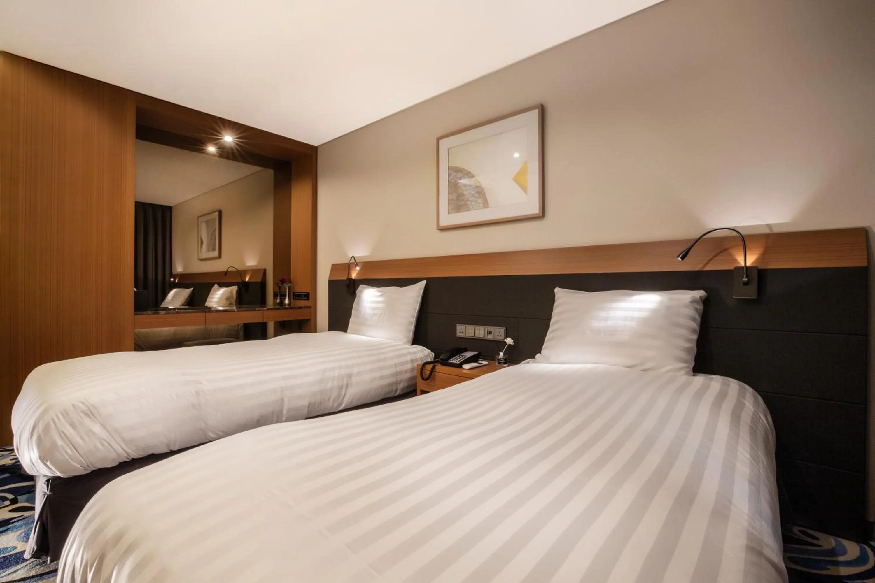 Bed in Shin Shin Hotel Jeju Airport