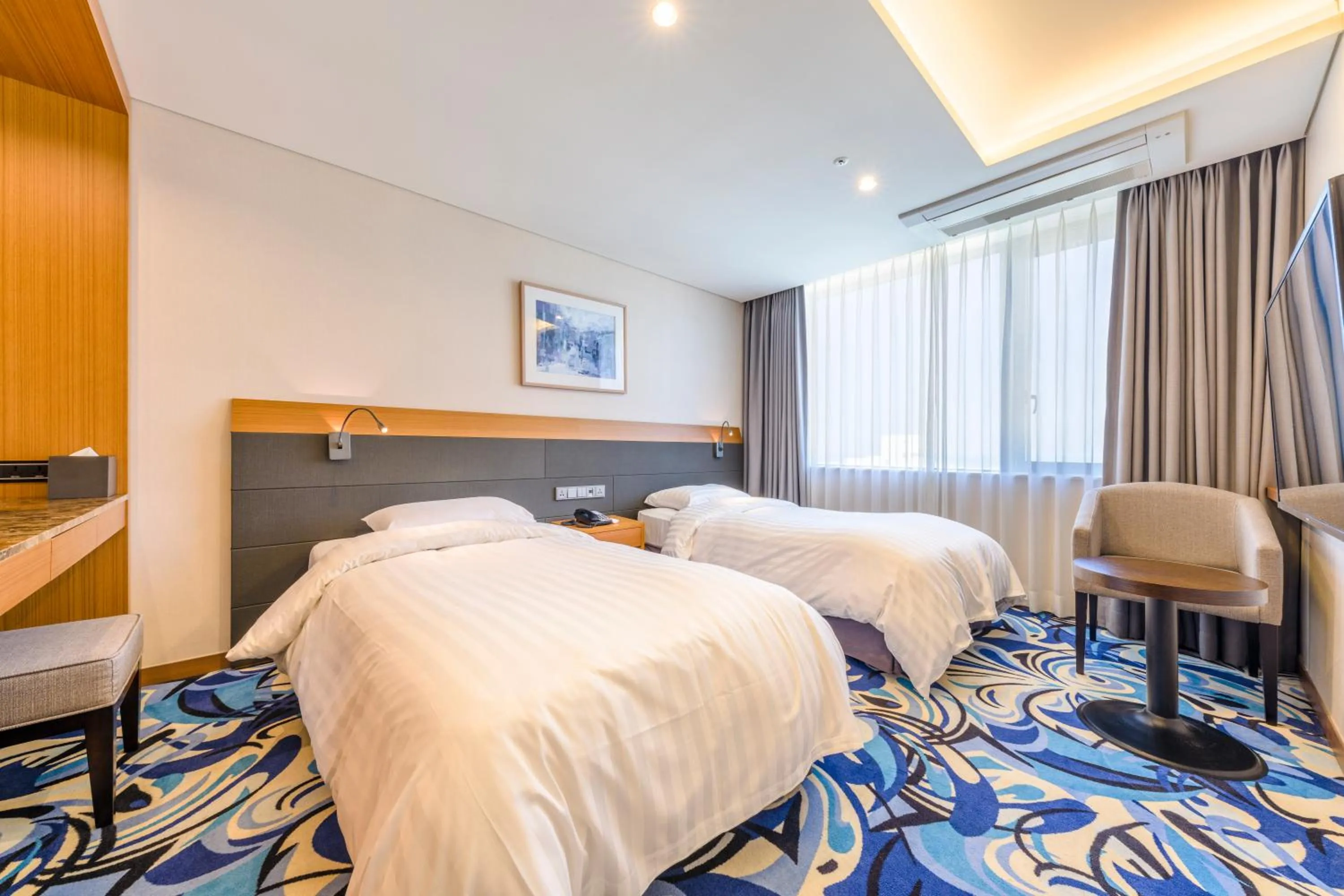 Decorative detail, Bed in Shin Shin Hotel Jeju Airport