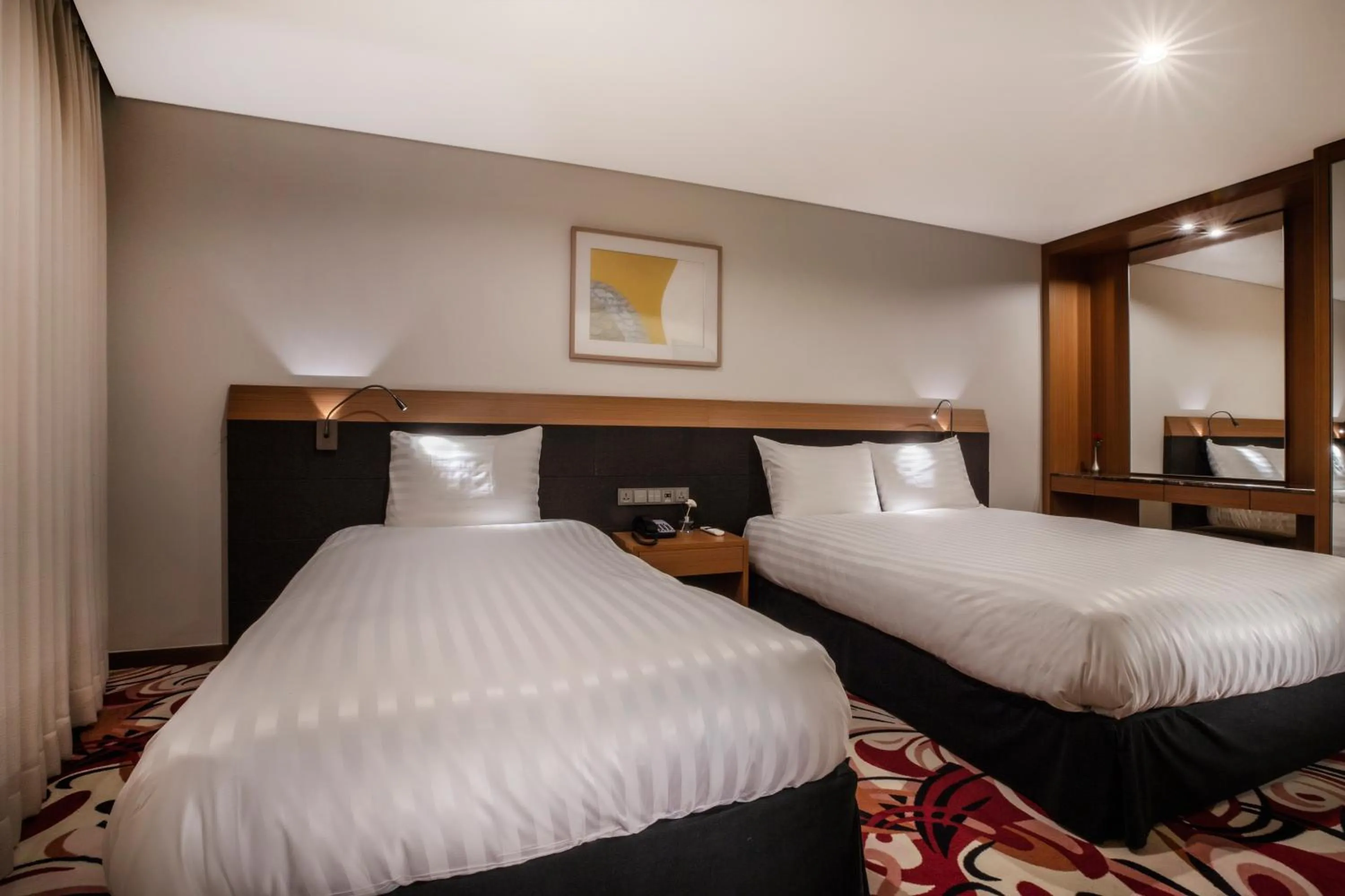 Bed in Shin Shin Hotel Jeju Airport