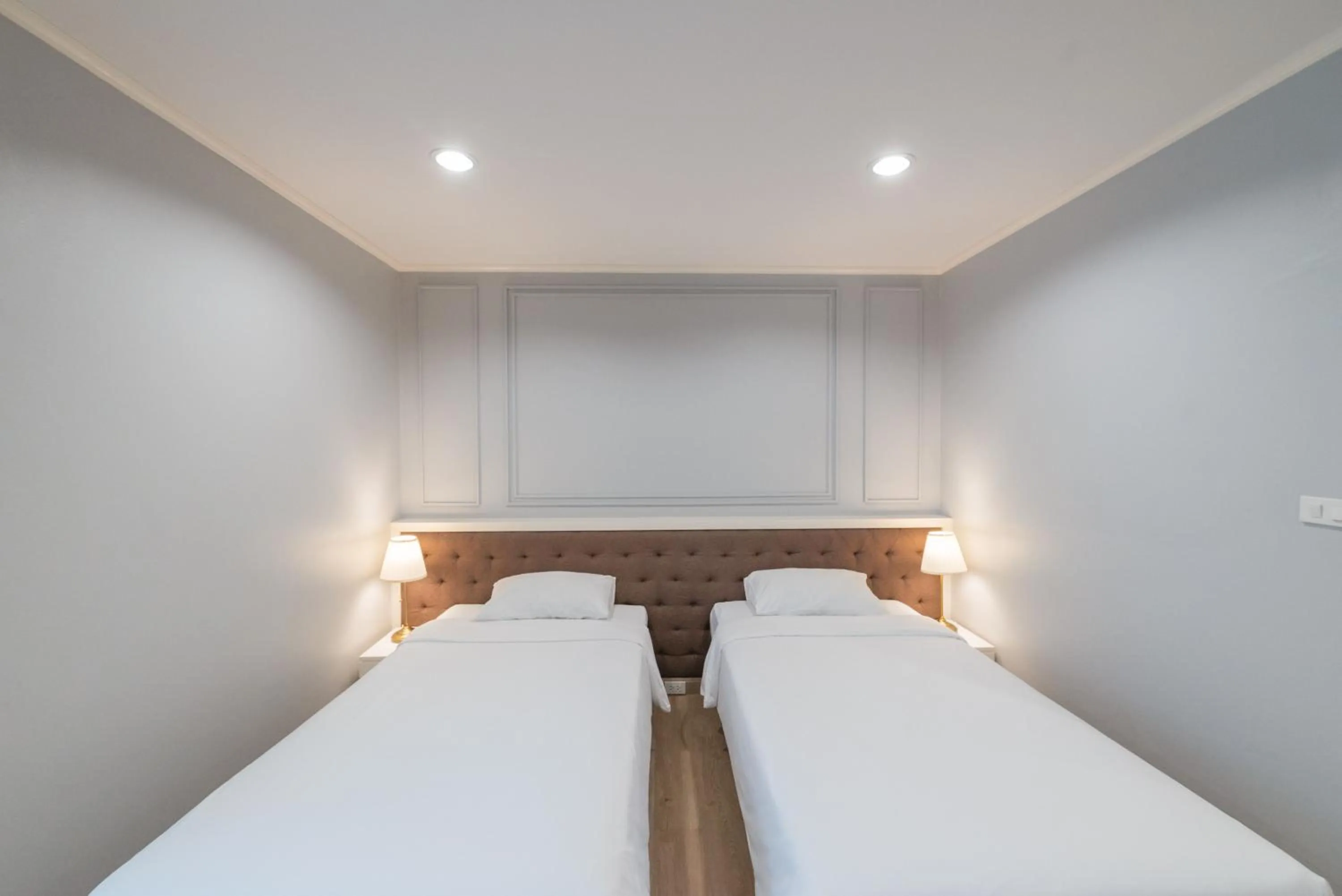 Bed in Jasmine Resort Sriracha