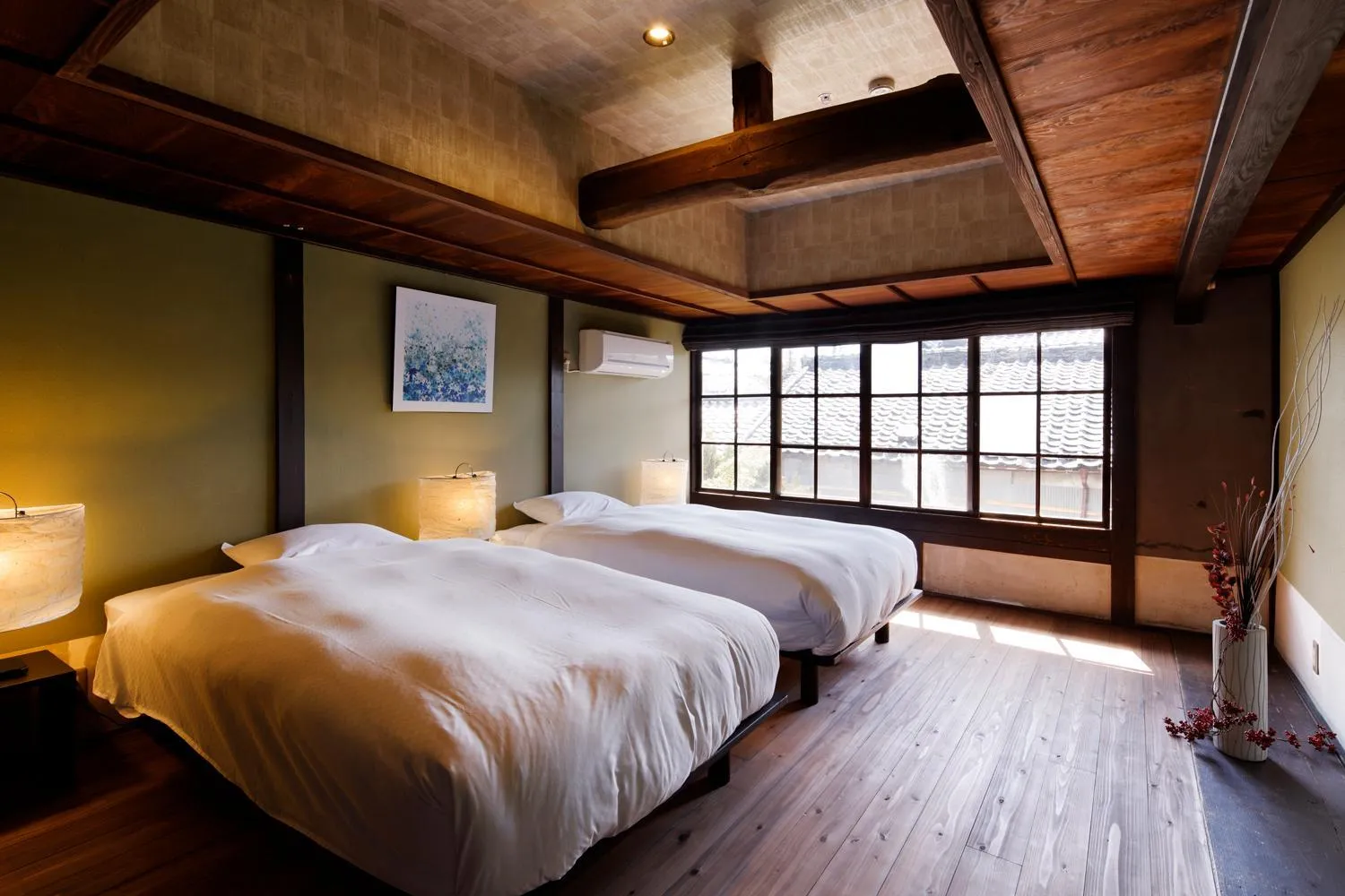 Bed in NIPPONIA Sasayama Castle Town Hotel