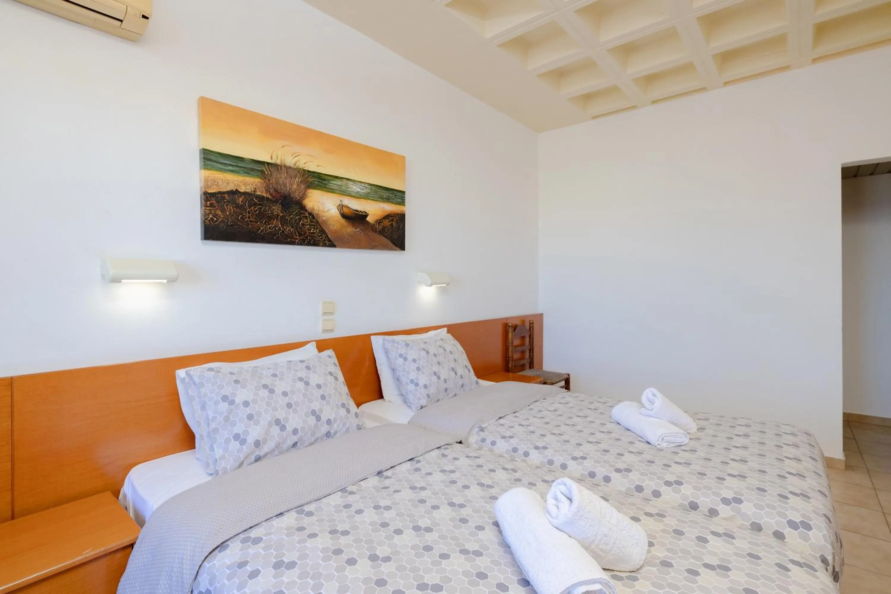 Bed in Heleni Beach Hotel