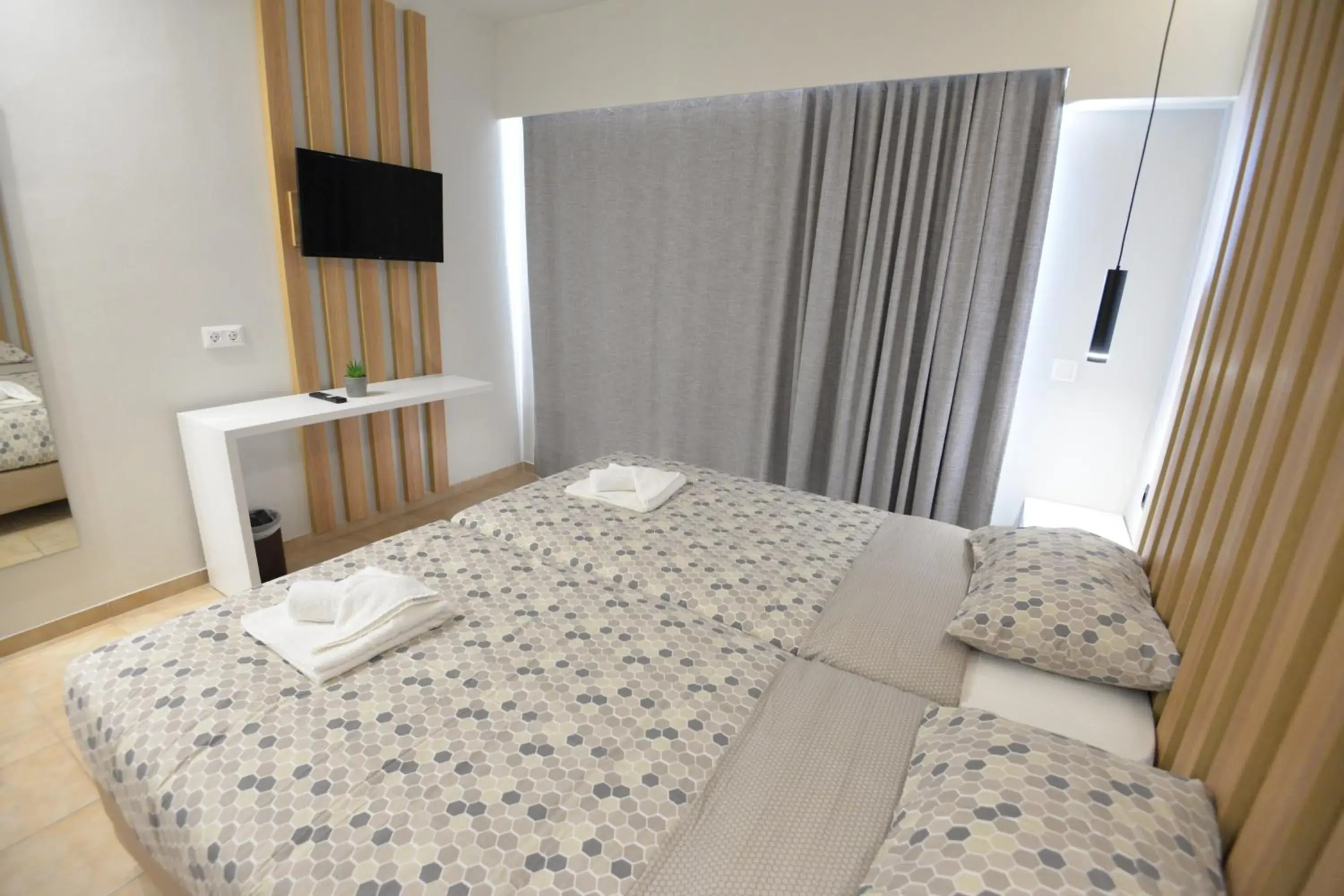 Bed in Heleni Beach Hotel Bed in Heleni Beach Hotel