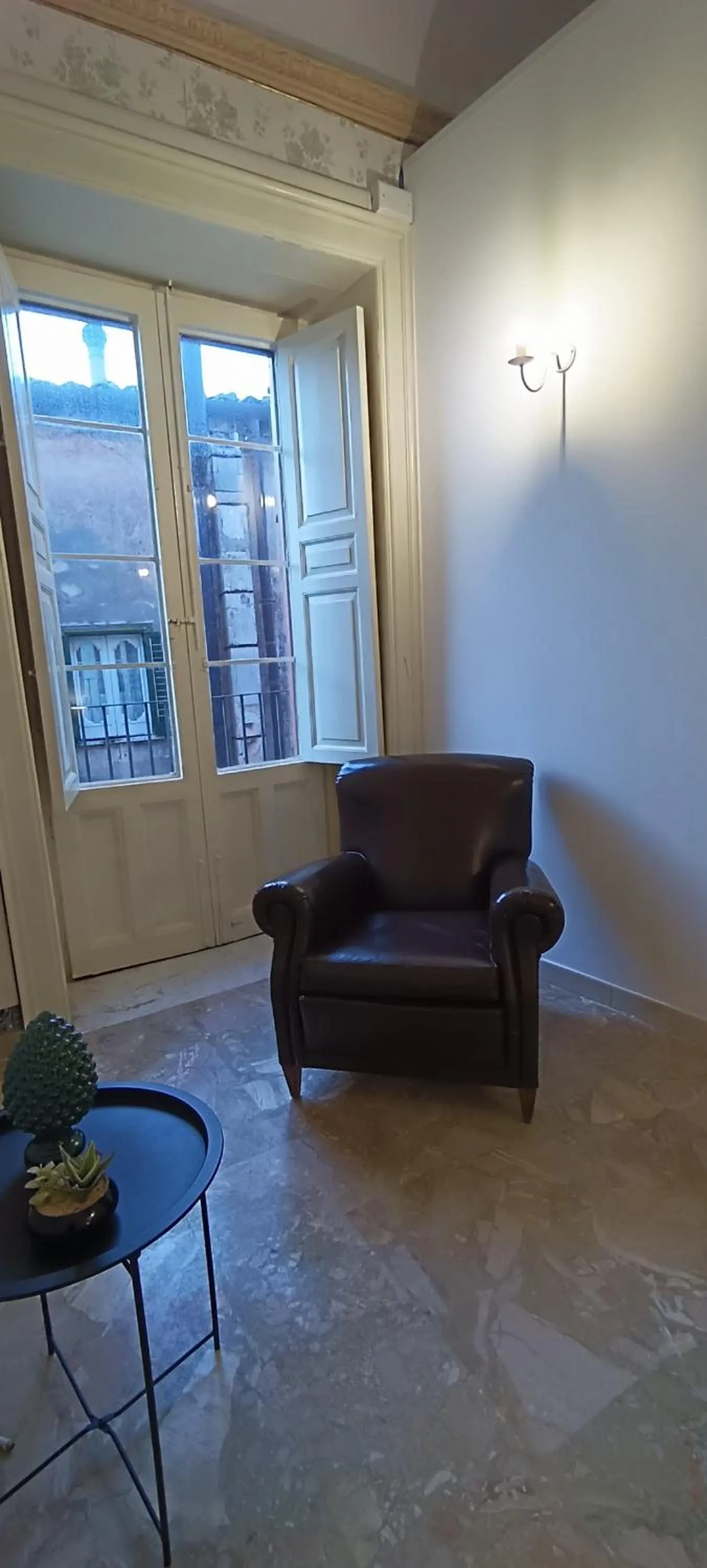 Seating area in Residenza Donnafugata B&B