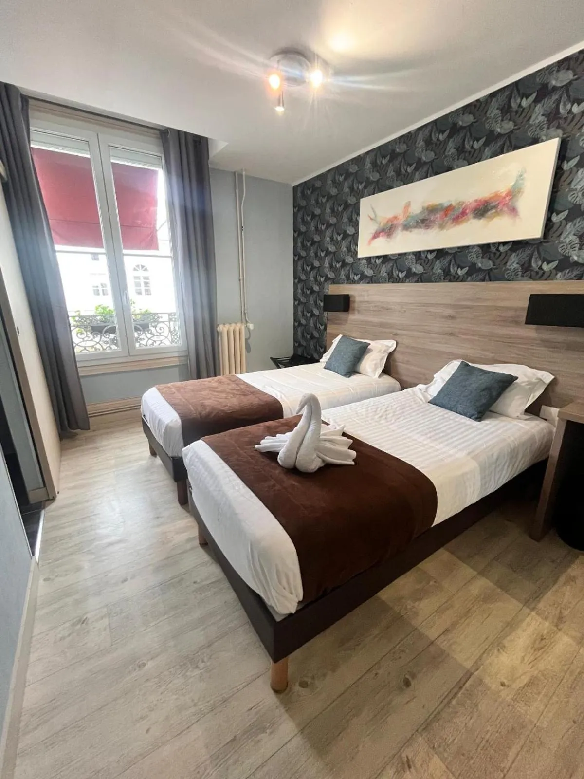 Bed in Hôtel L'Univers