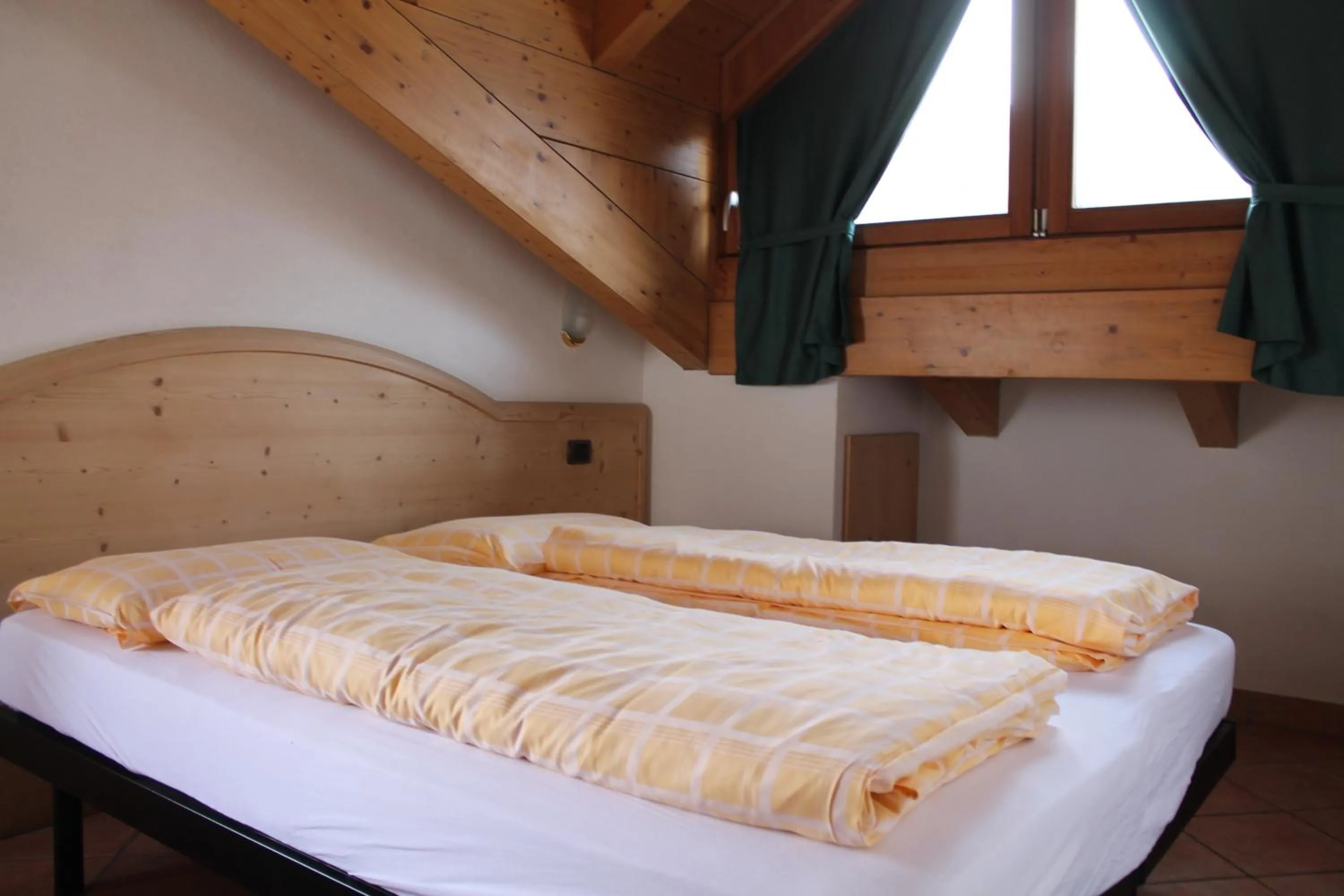 Bed in Hotel Miramonti