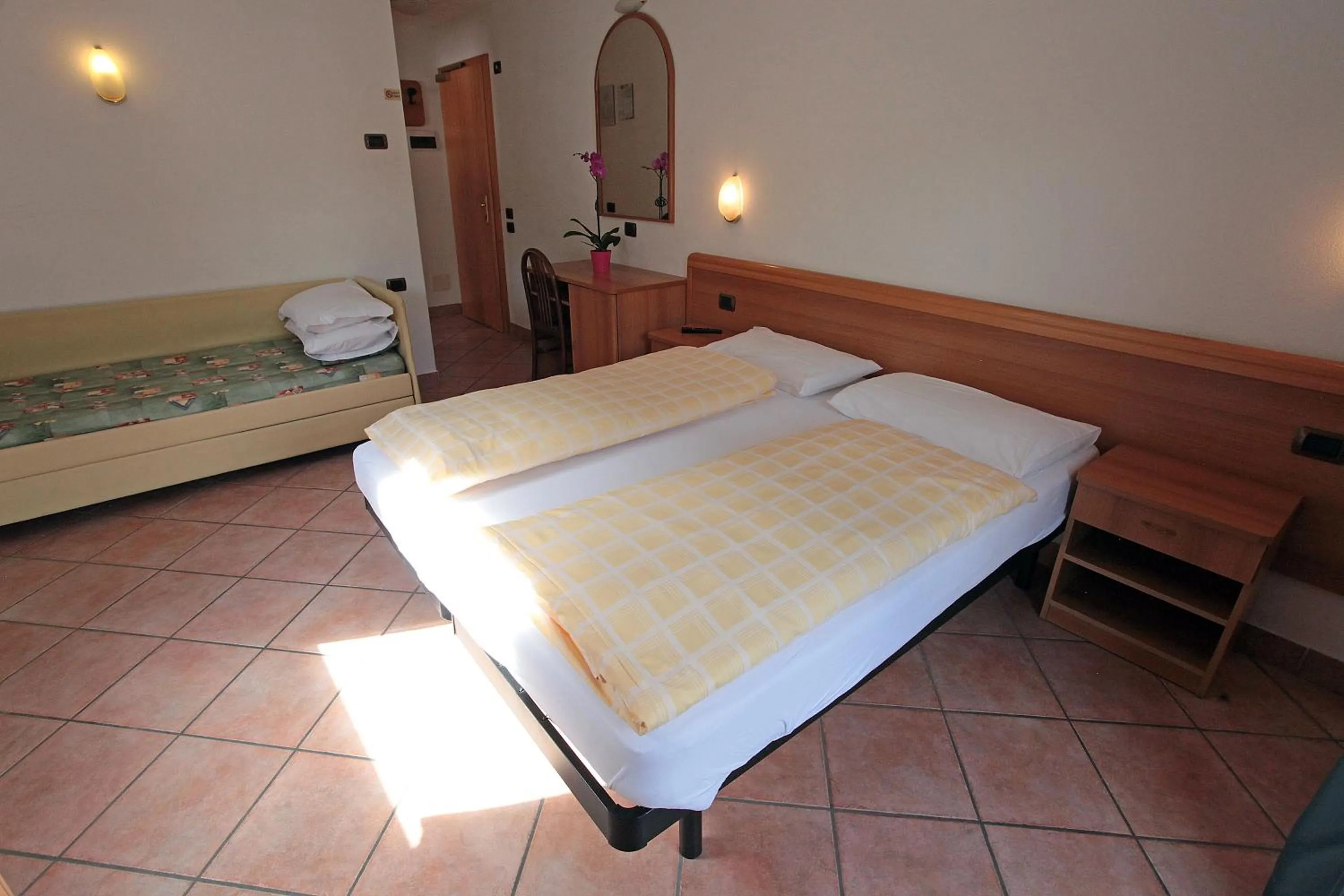 Bedroom in Hotel Miramonti