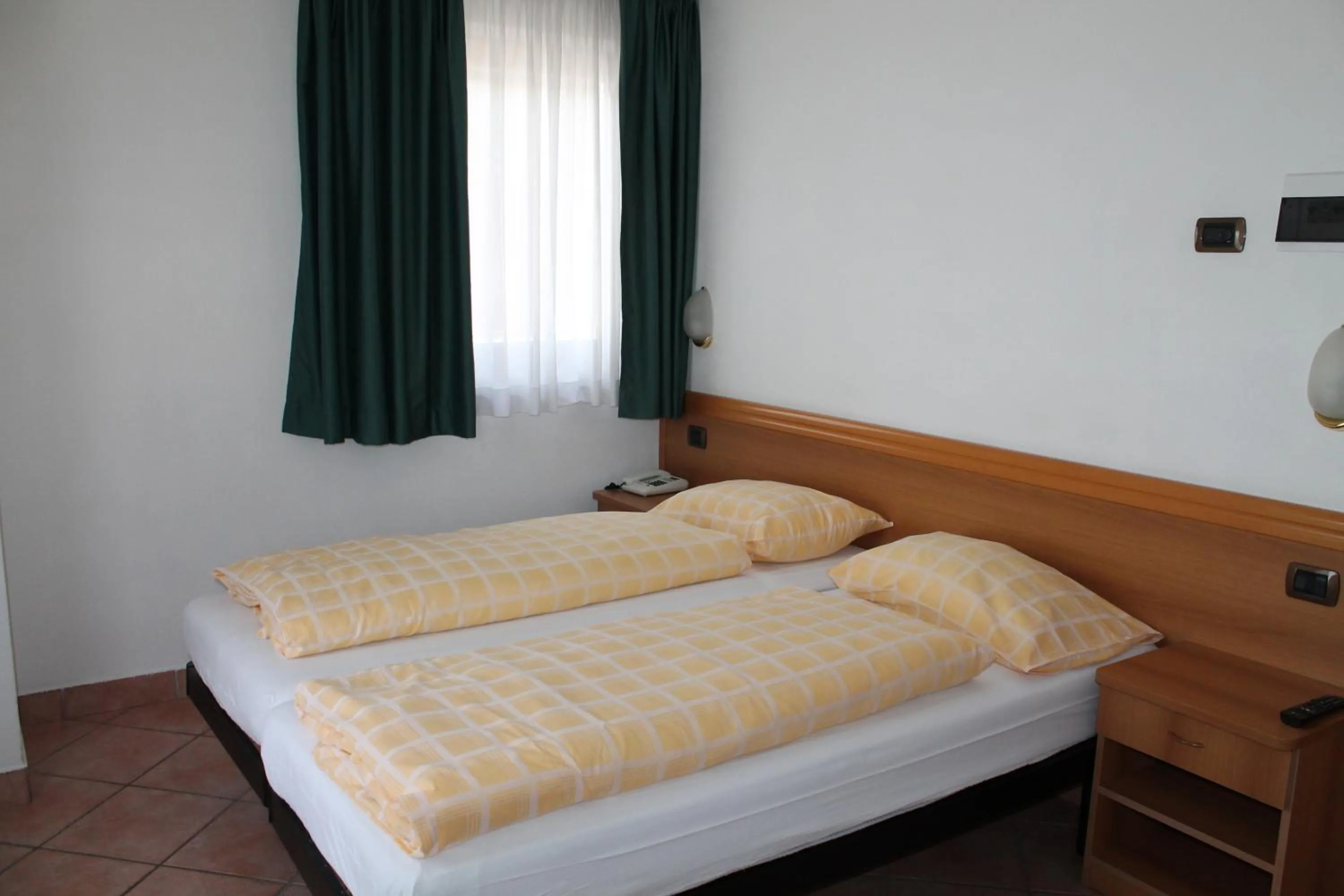 Bed in Hotel Miramonti