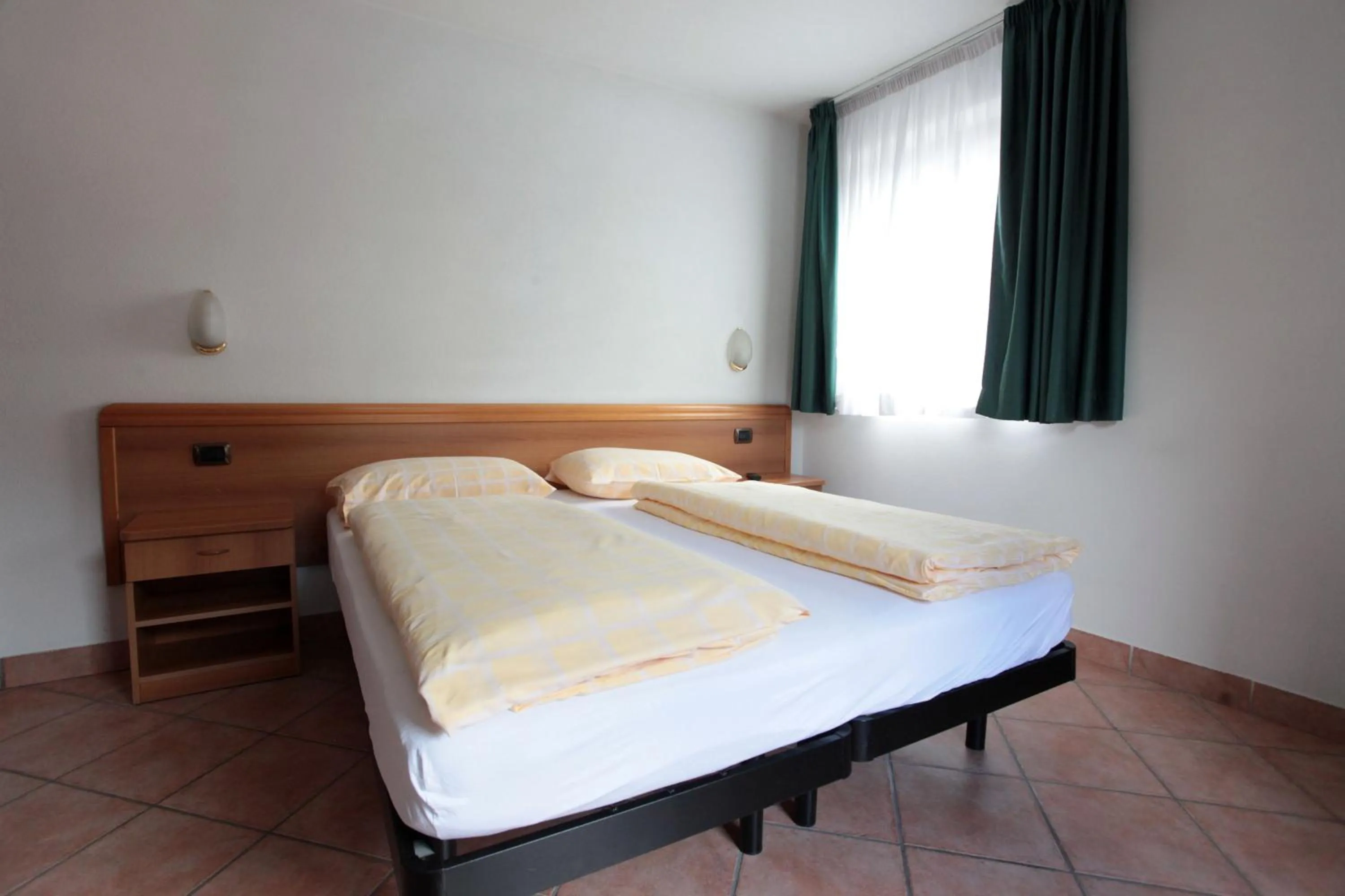 Bedroom in Hotel Miramonti