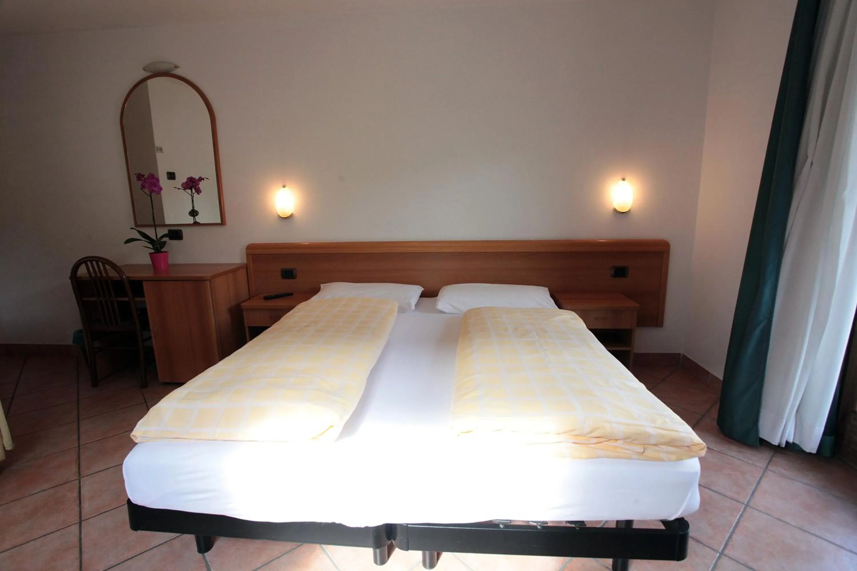 Bedroom in Hotel Miramonti