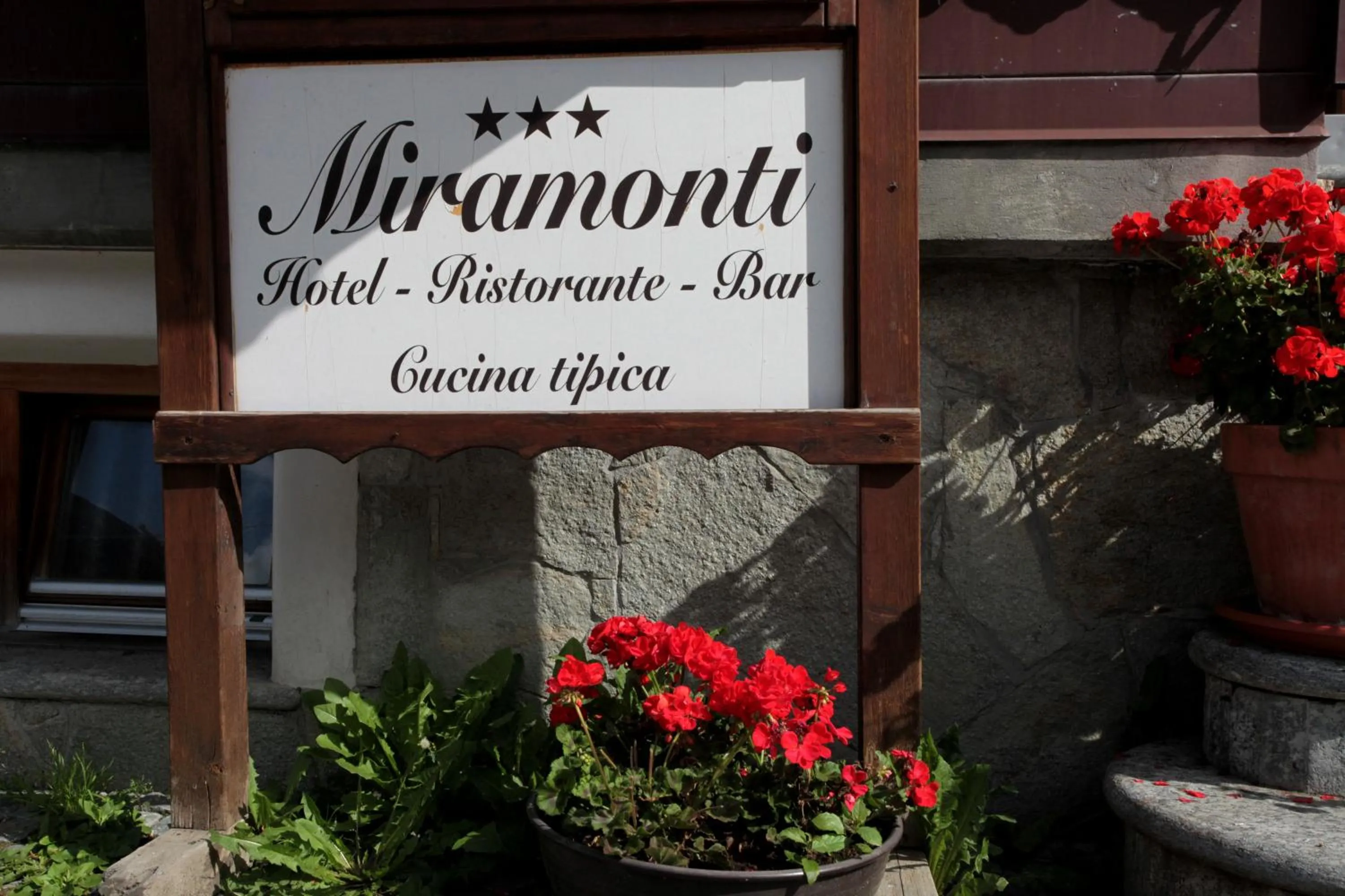 Property logo or sign in Hotel Miramonti