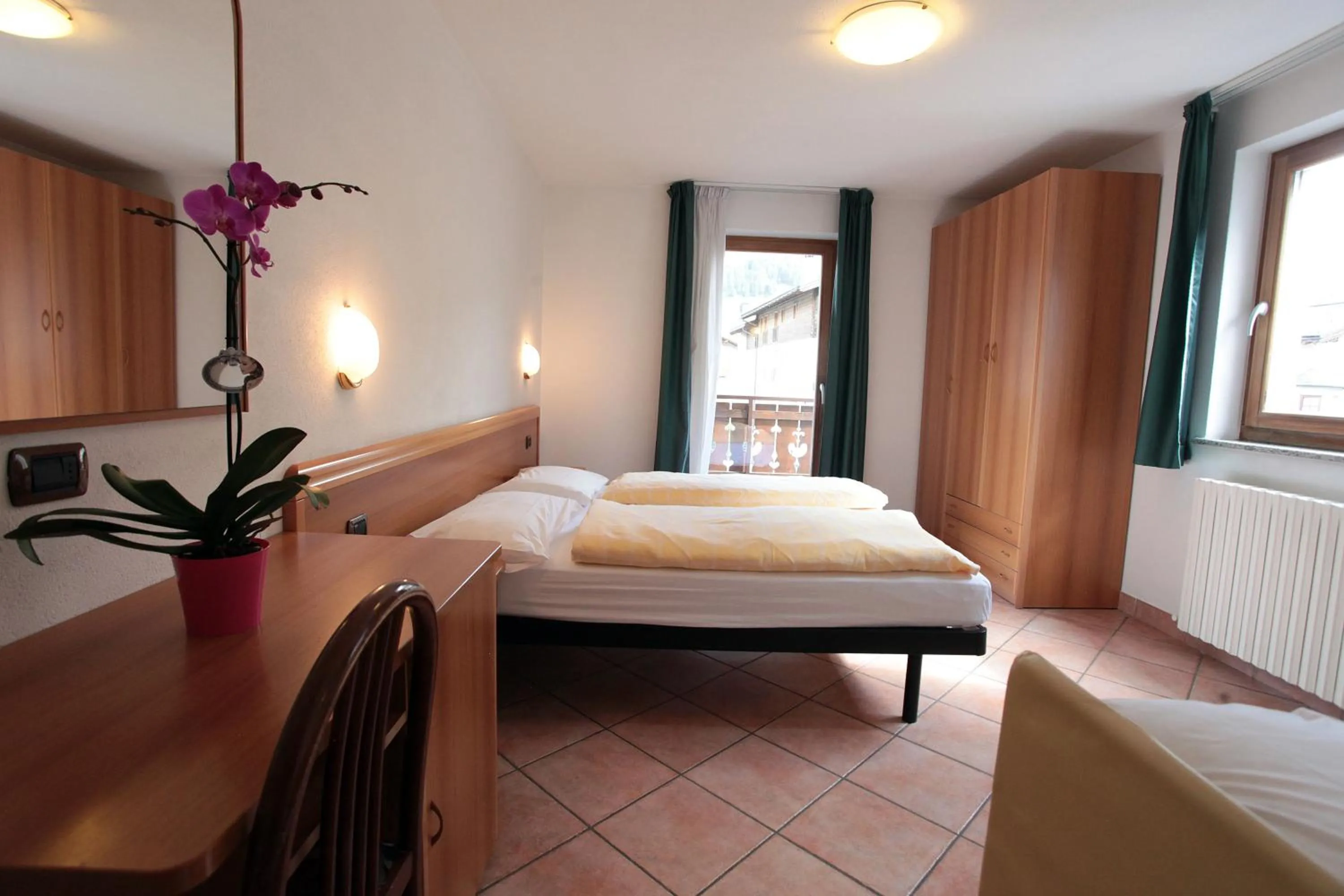 Bedroom in Hotel Miramonti