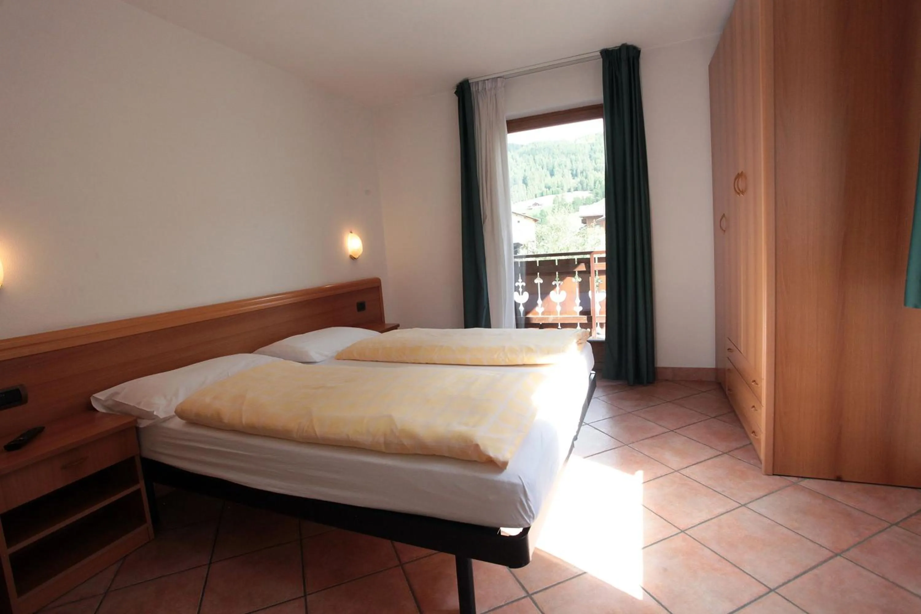 Bedroom in Hotel Miramonti