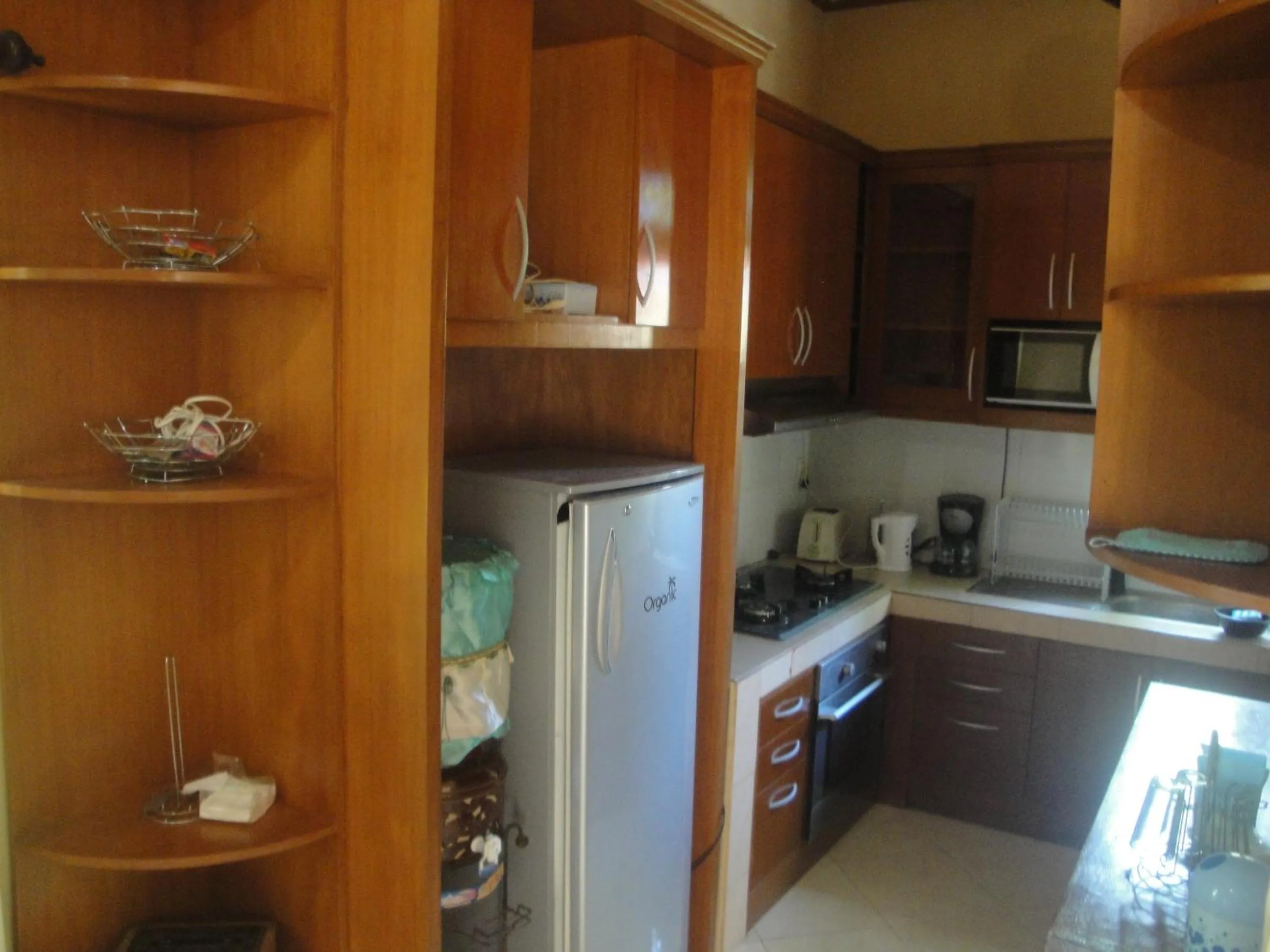 Kitchen or kitchenette in Sari Inn Kuta Lombok