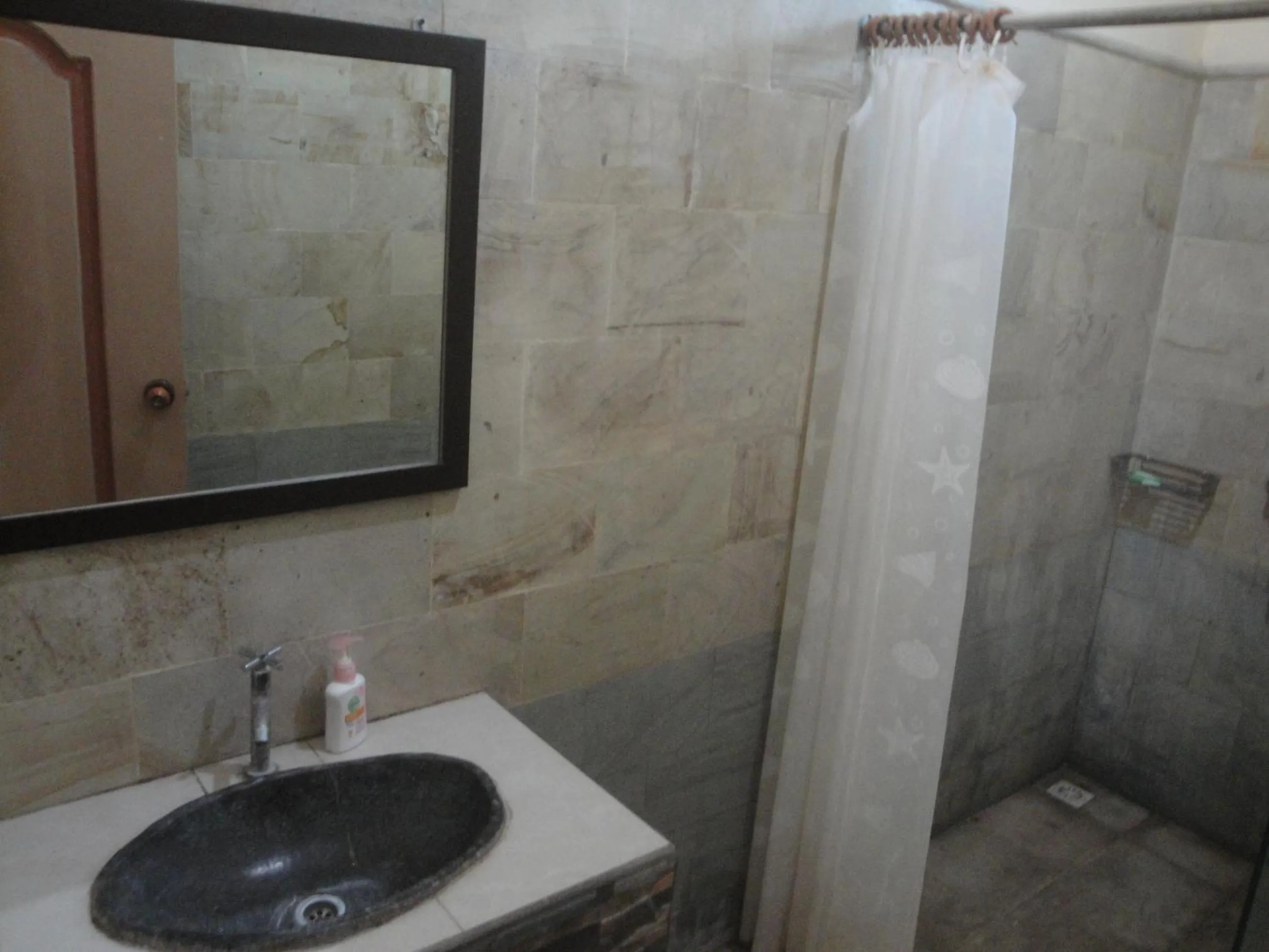 Bathroom in Sari Inn Kuta Lombok