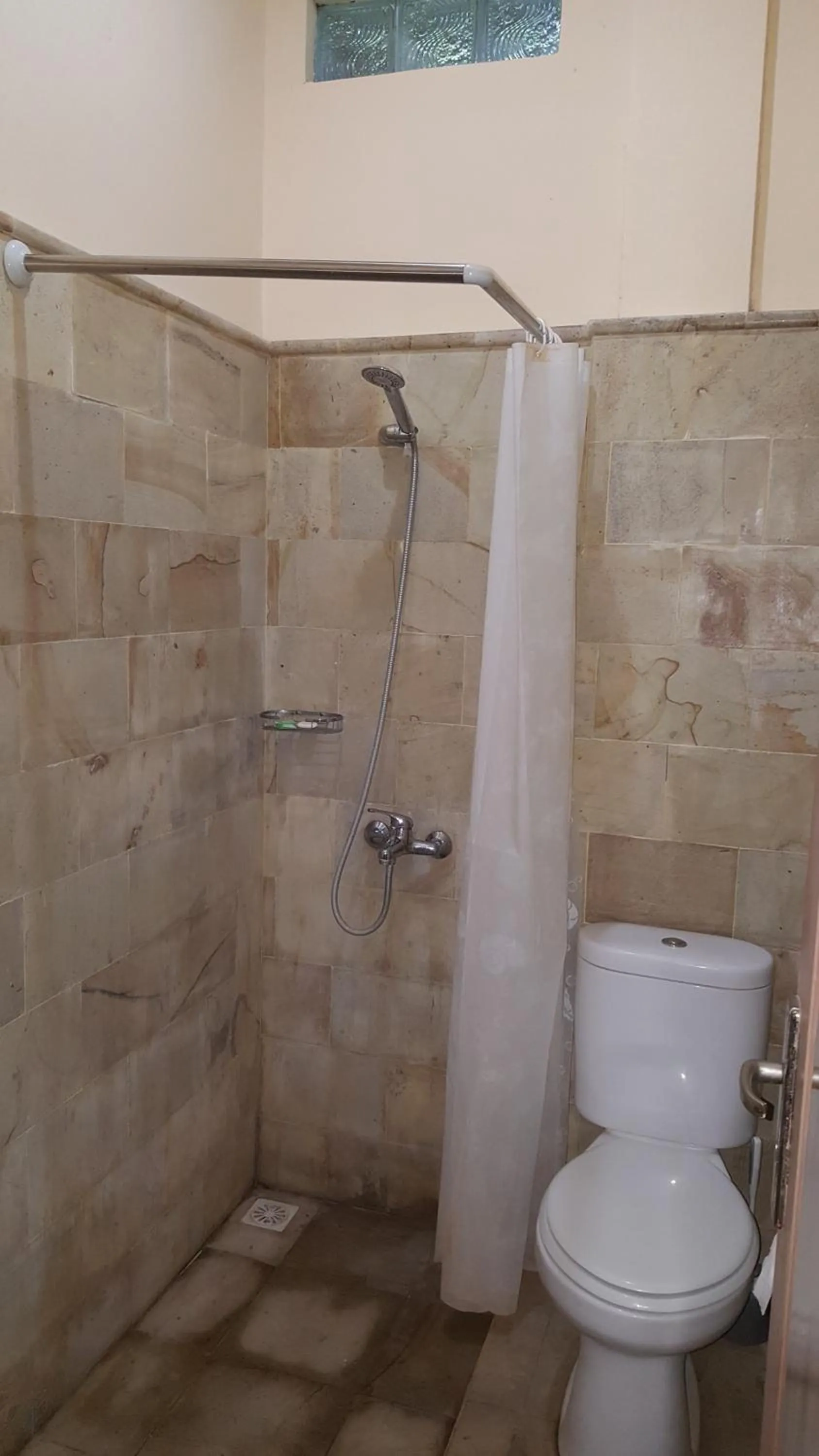 Bathroom in Sari Inn Kuta Lombok