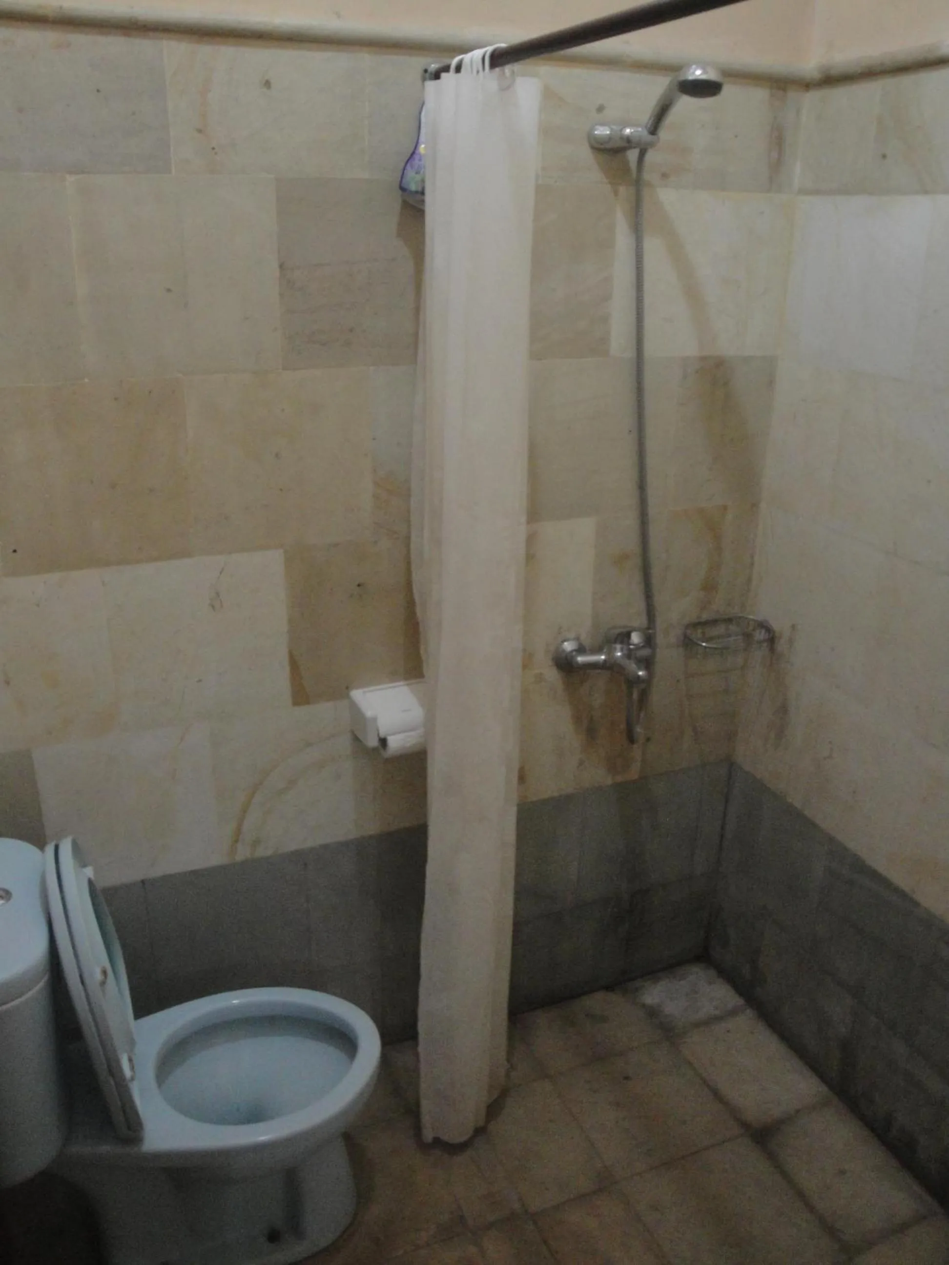 Bathroom in Sari Inn Kuta Lombok