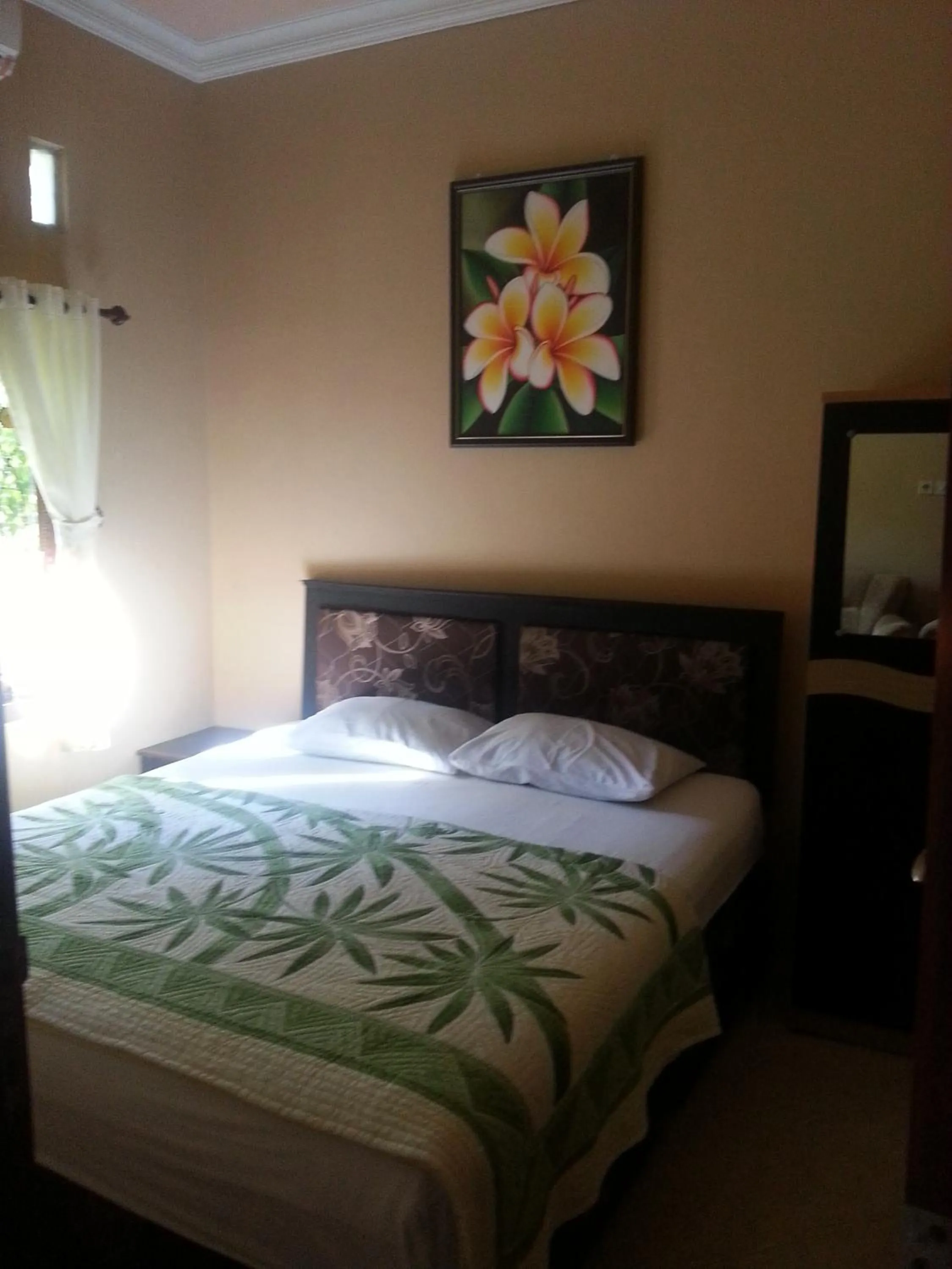 Bedroom, Bed in Sari Inn Kuta Lombok