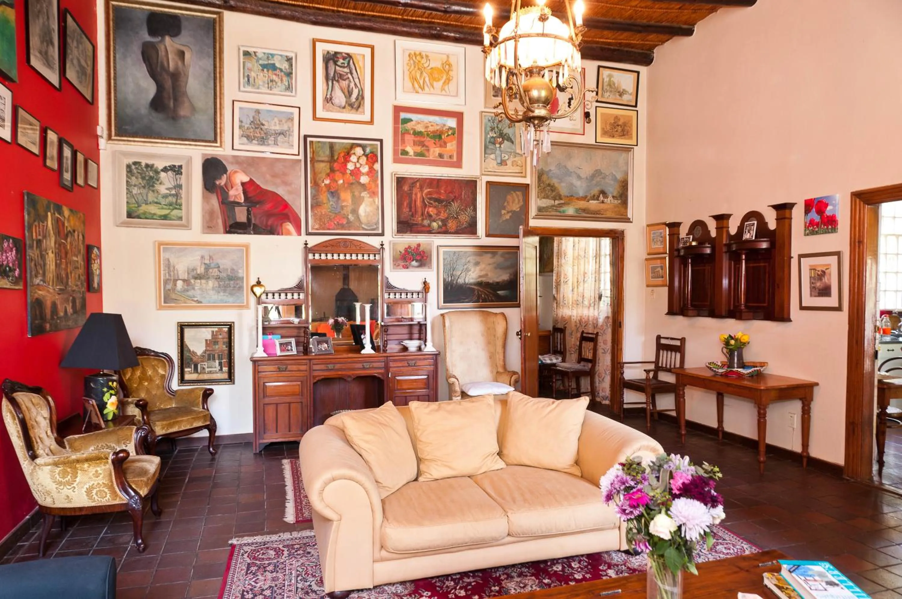 Communal lounge/ TV room in Wittedrift Manor House