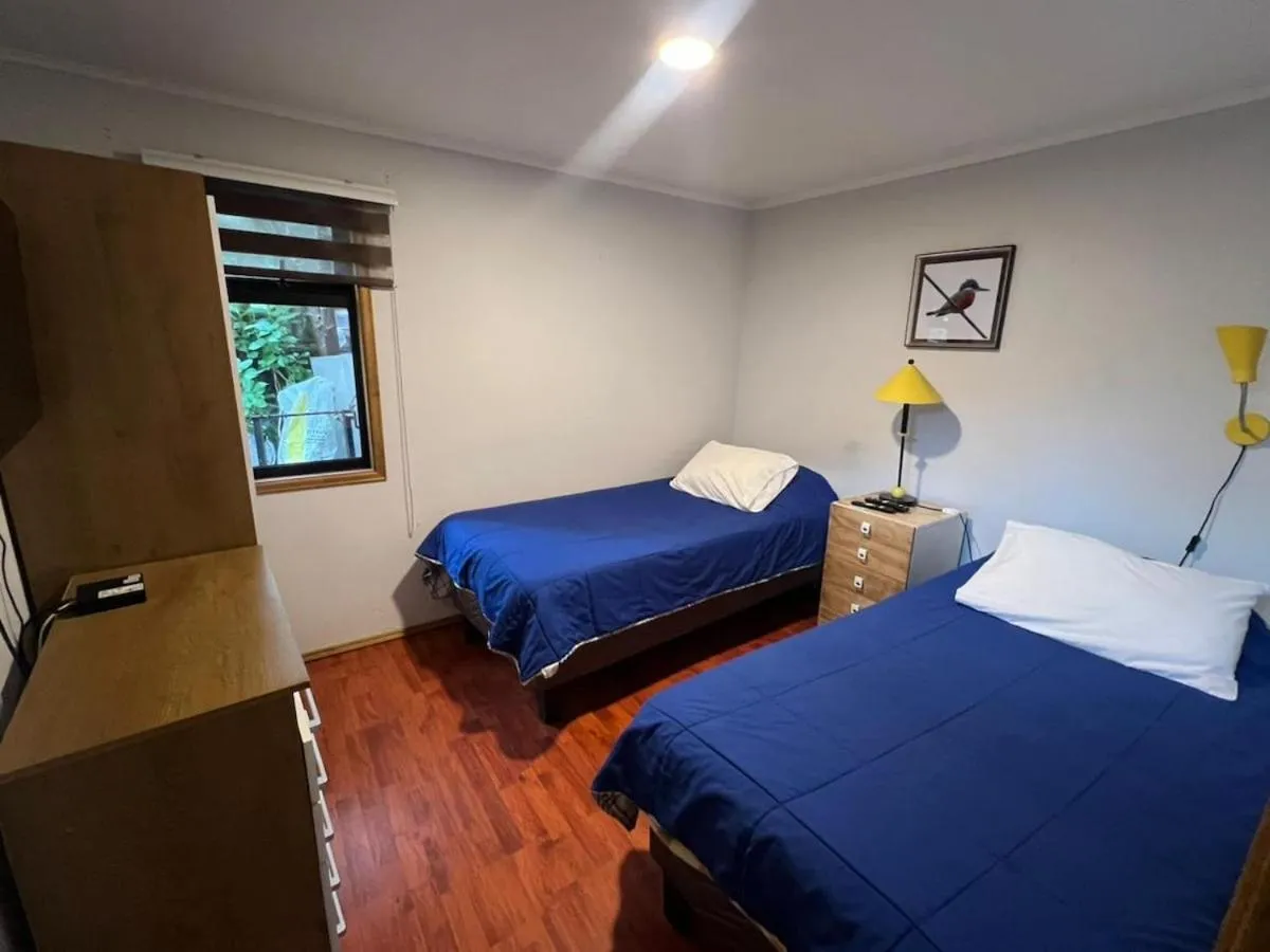 Photo of the whole room, Bed in Hospedaje El Roble, Puerto Varas