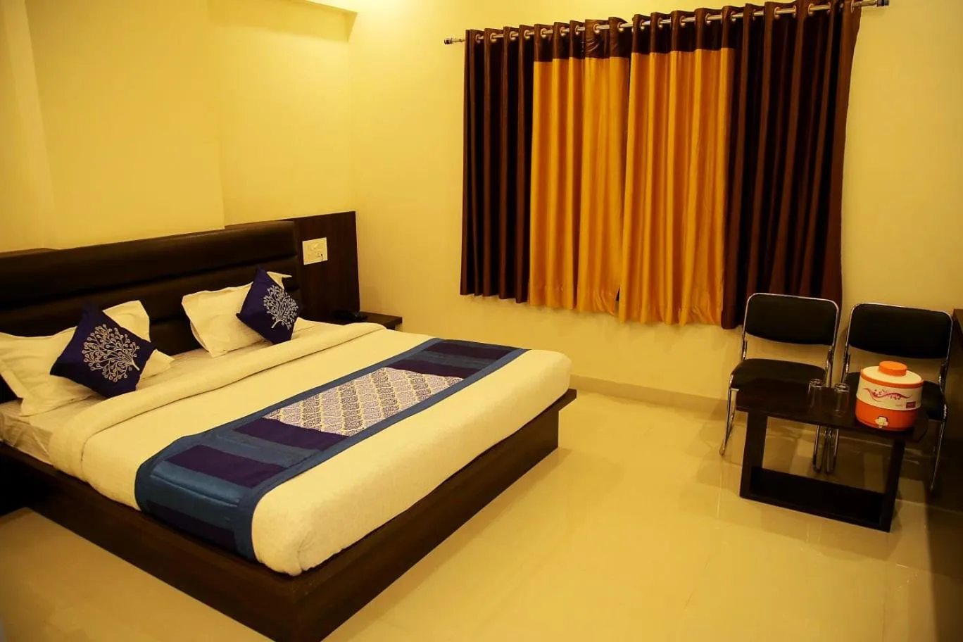 Bed in Hotel Riddhi Inn