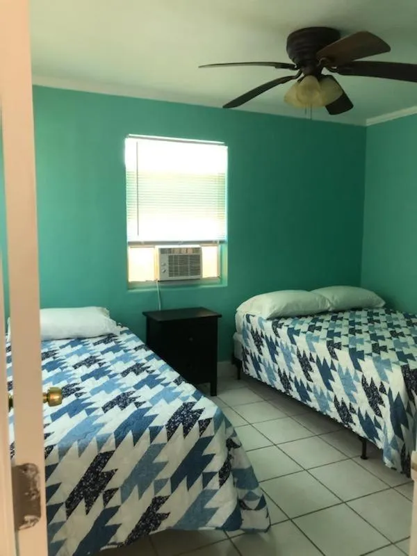 Bed in Old Wooden Bridge Resort & Marina