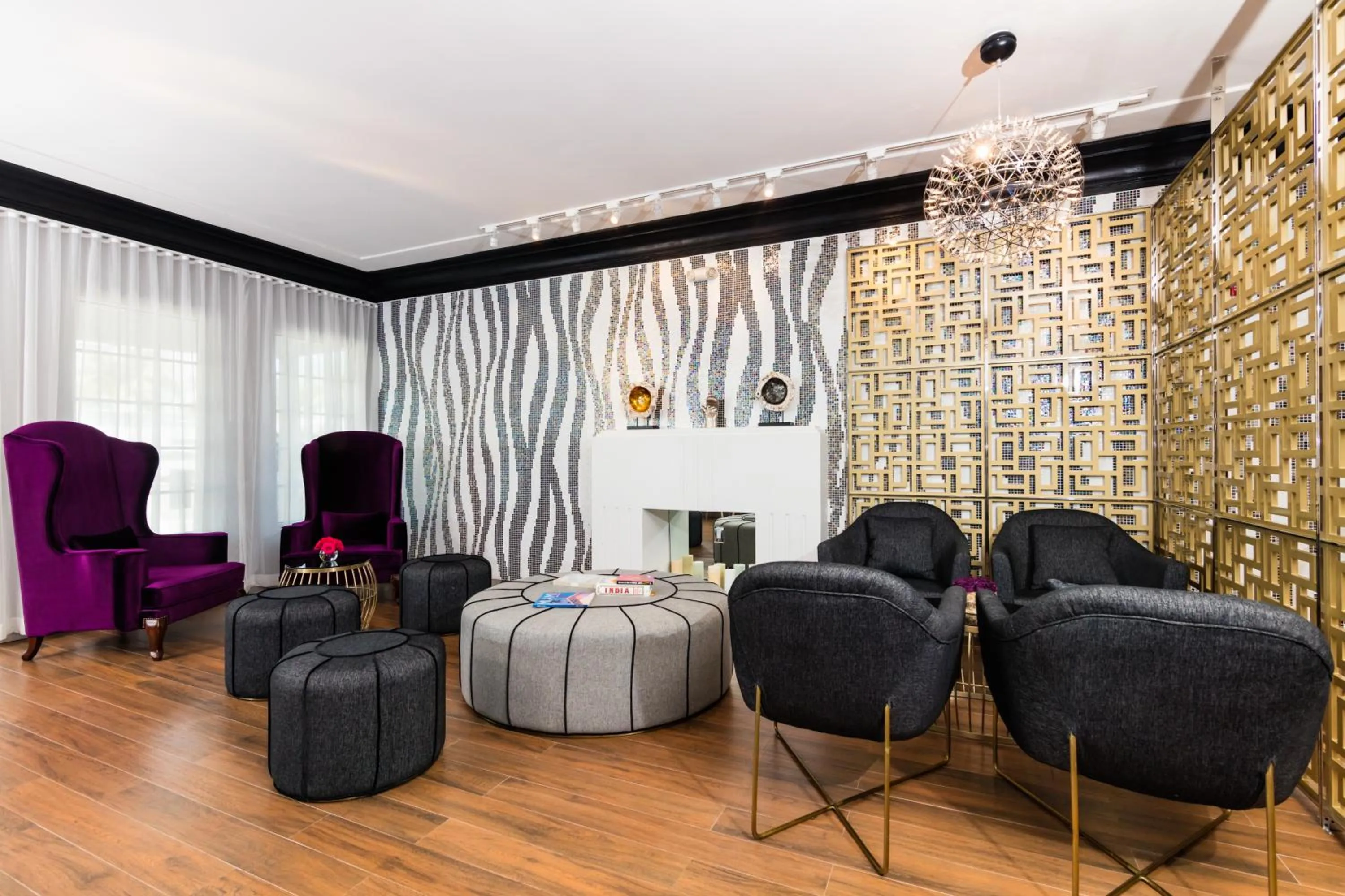 Communal lounge/ TV room, Seating Area in L Hotel