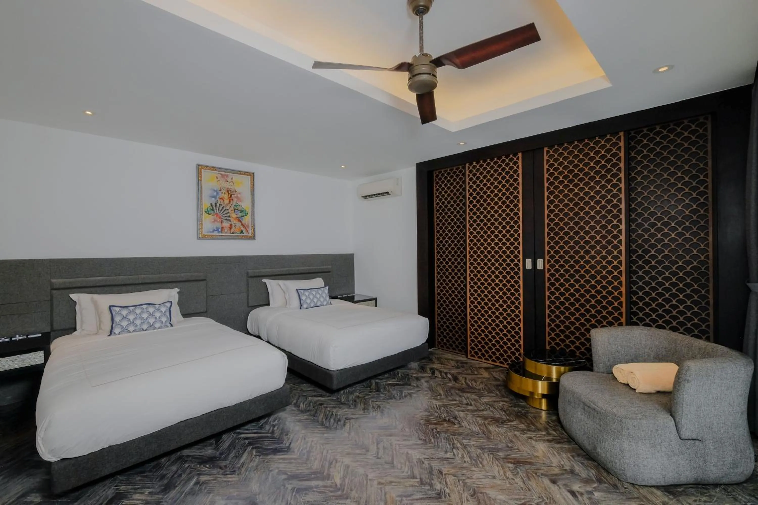 Bed in Prasana Villas by Arjani Resorts