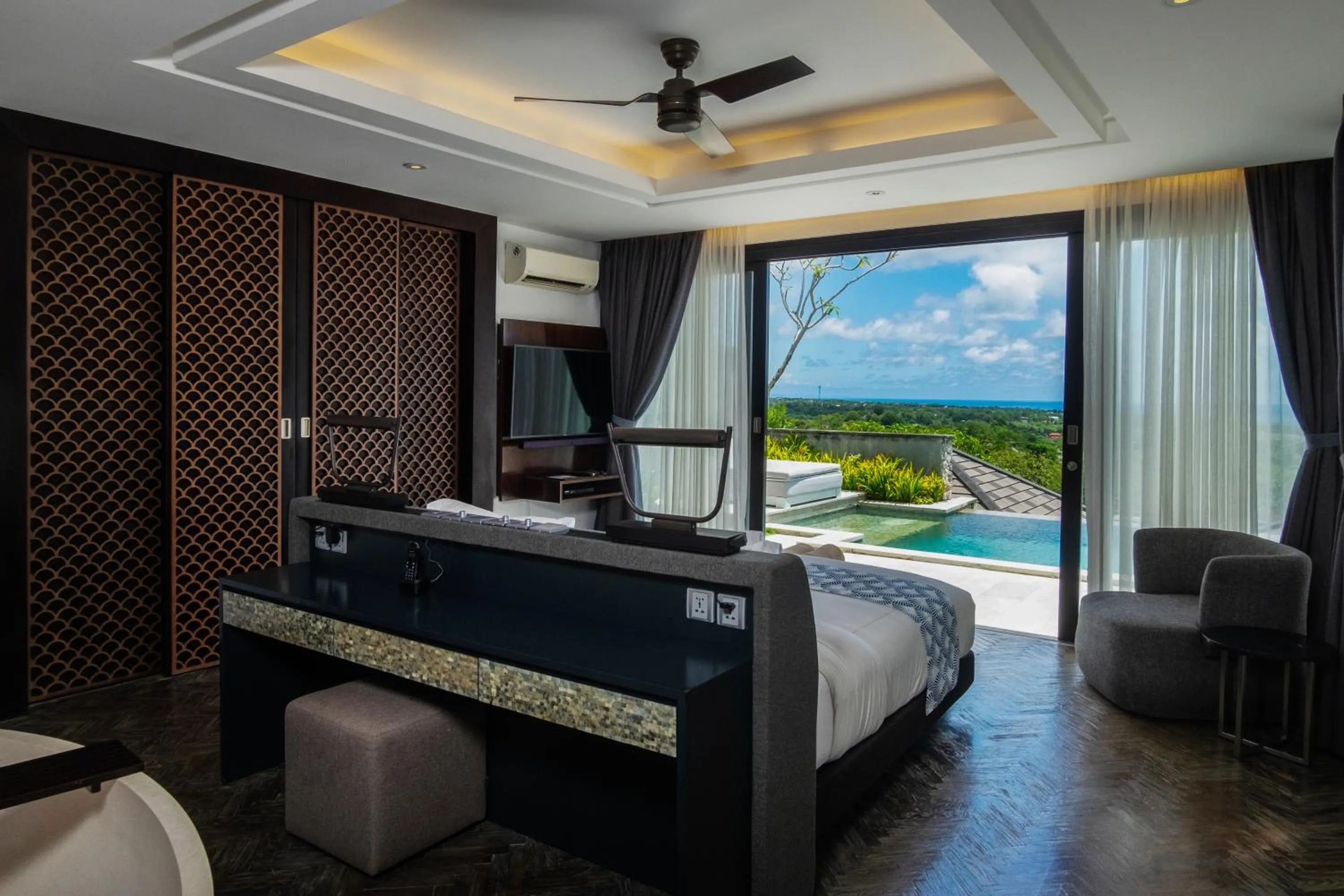 Bed in Prasana Villas by Arjani Resorts