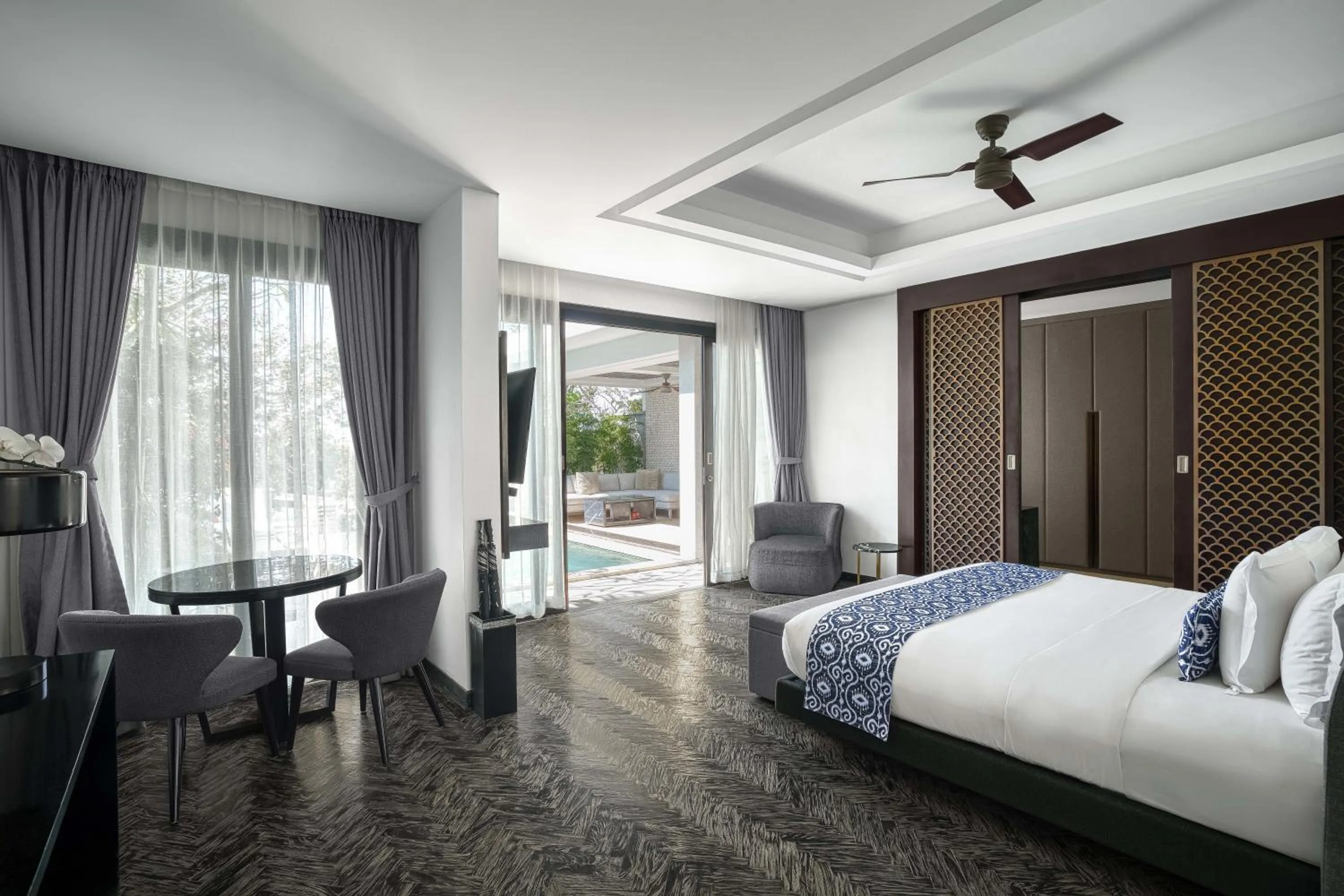 Bed in Prasana Villas by Arjani Resorts