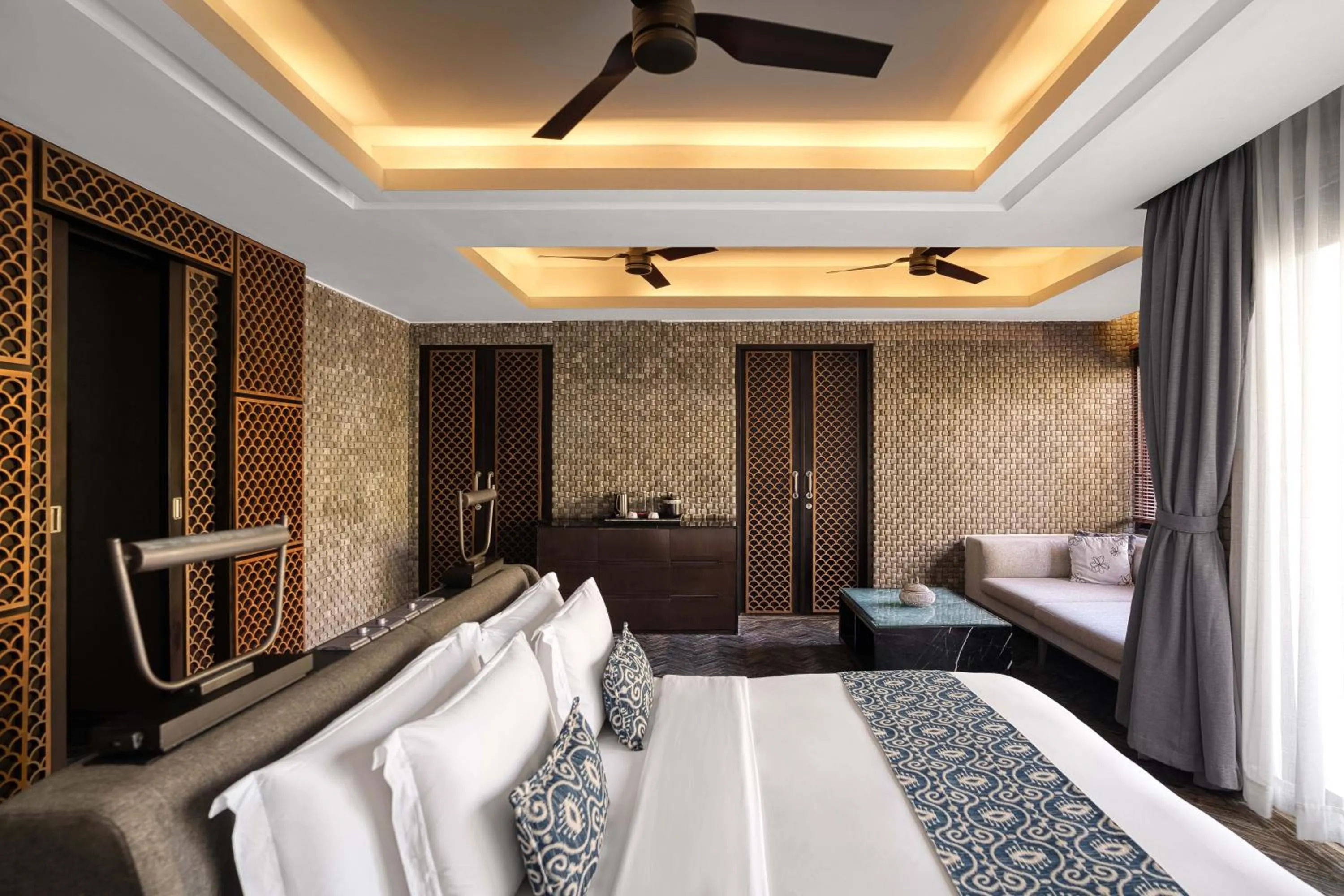 Bed in Prasana Villas by Arjani Resorts