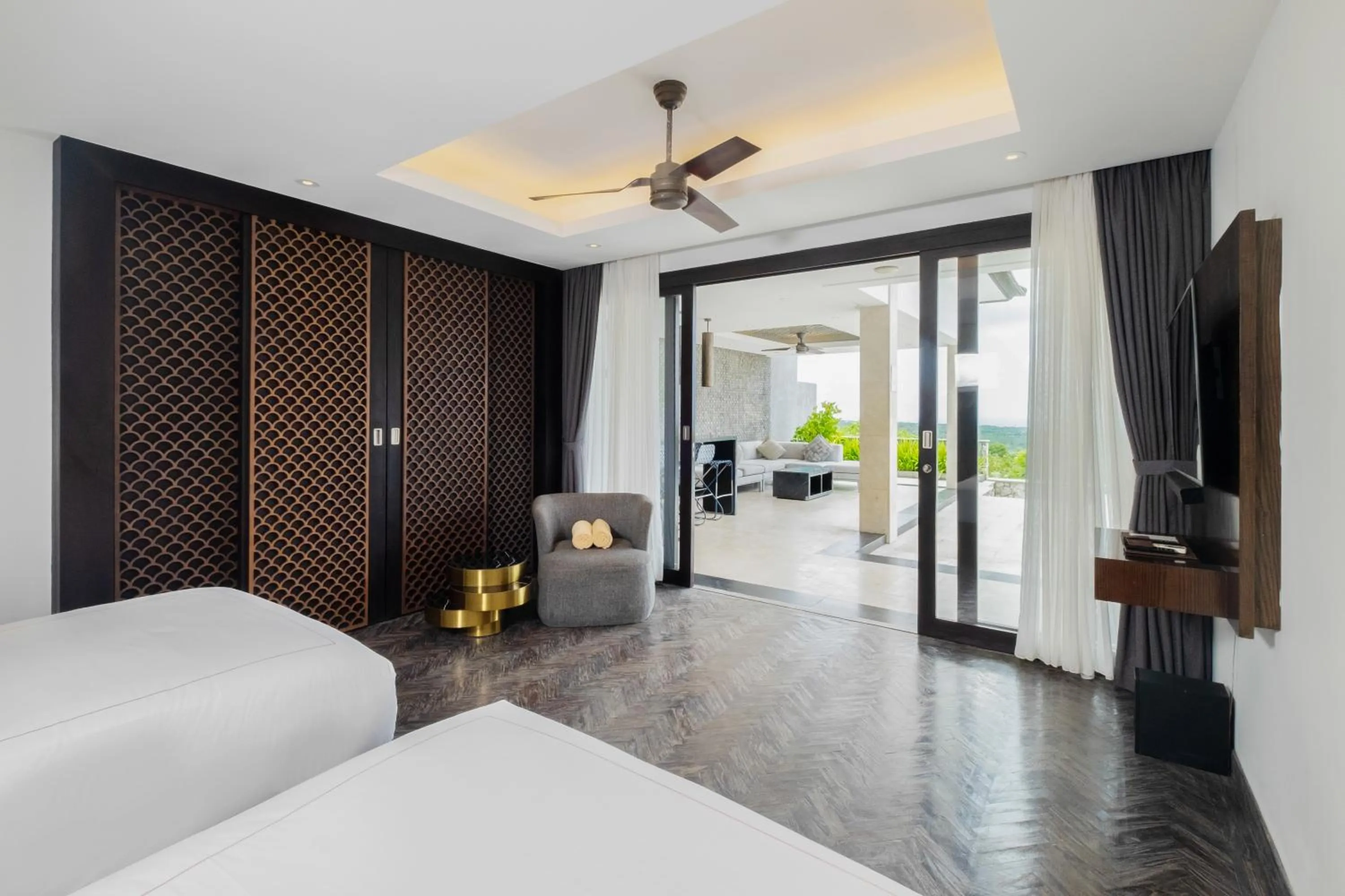 Bed in Prasana Villas by Arjani Resorts