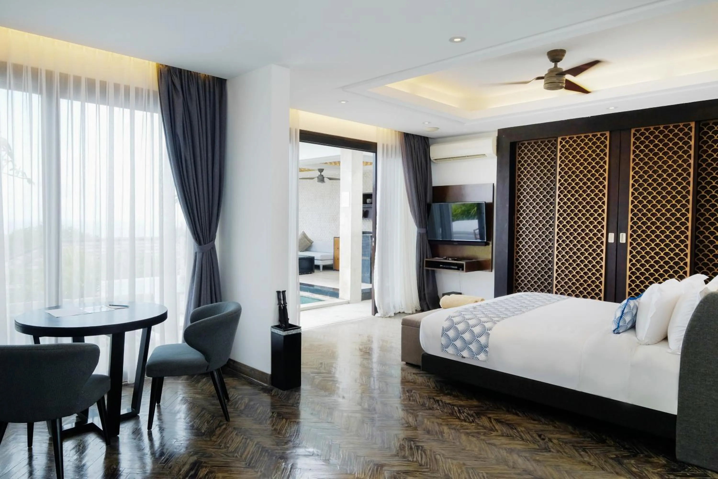 Bed in Prasana Villas by Arjani Resorts