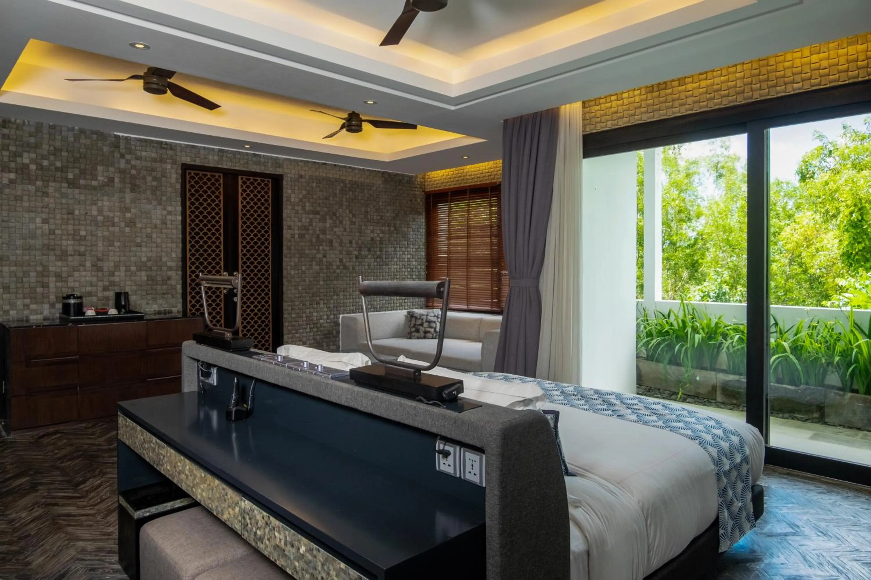 Bed in Prasana Villas by Arjani Resorts