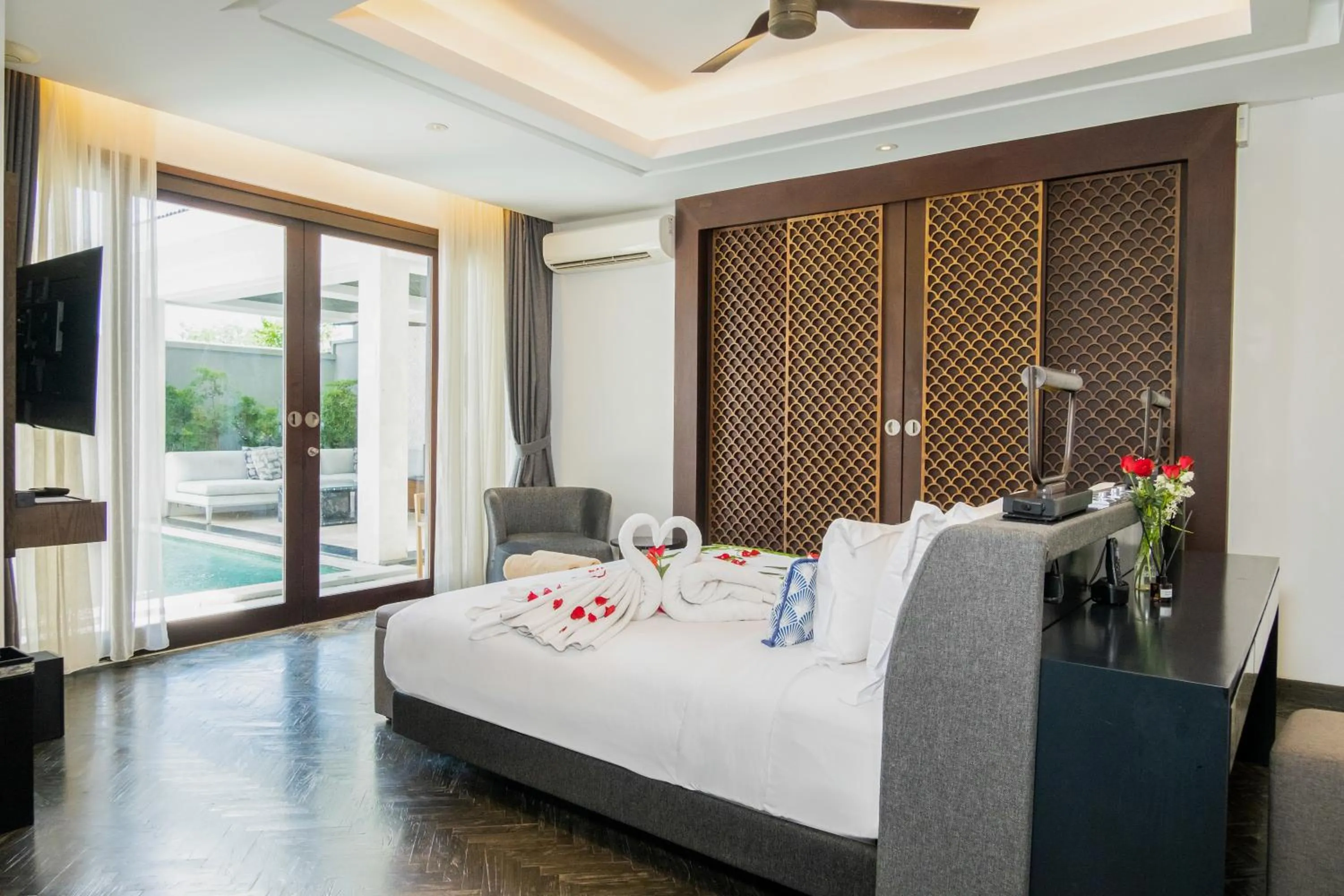 Bed in Prasana Villas by Arjani Resorts