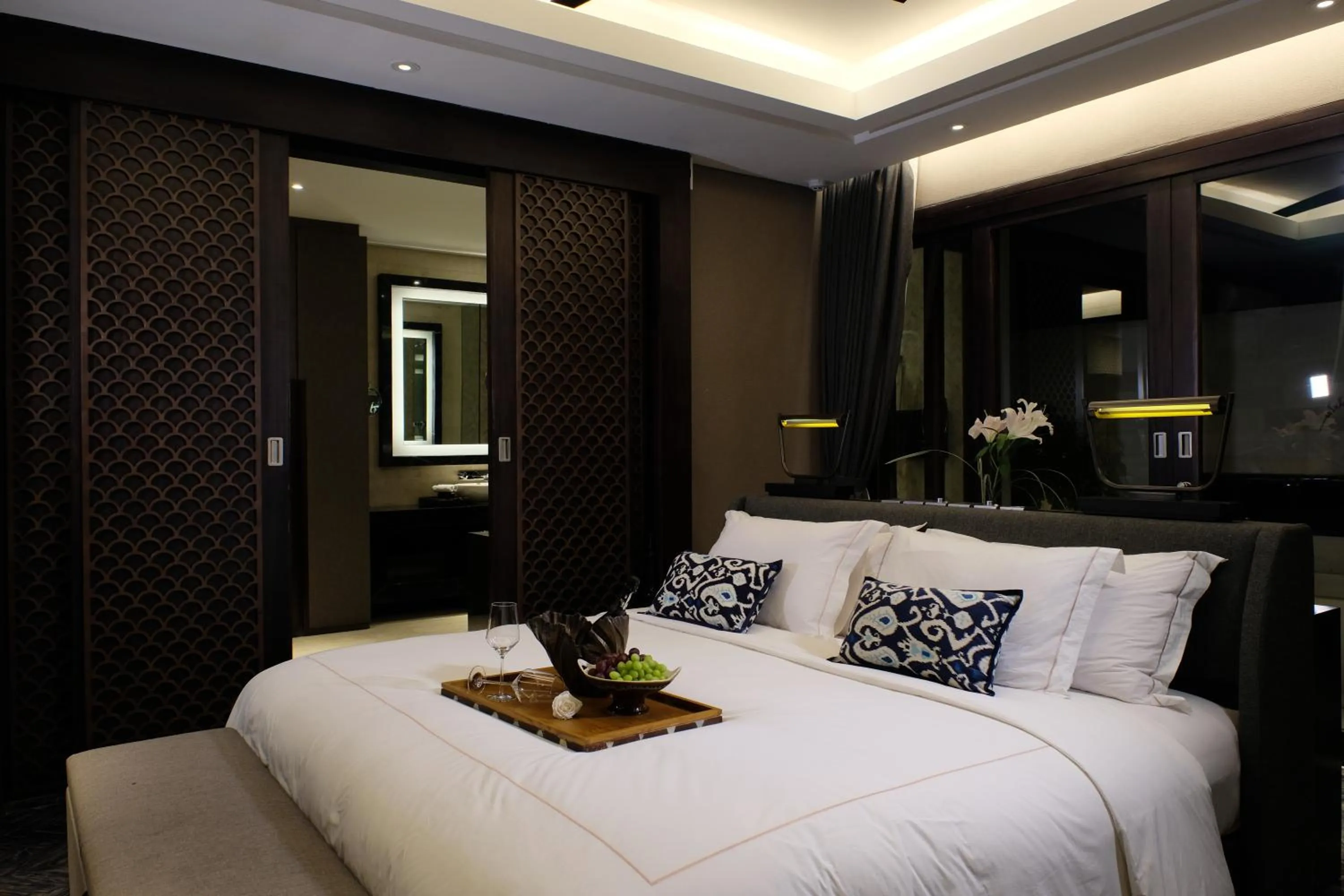 Bed in Prasana Villas by Arjani Resorts