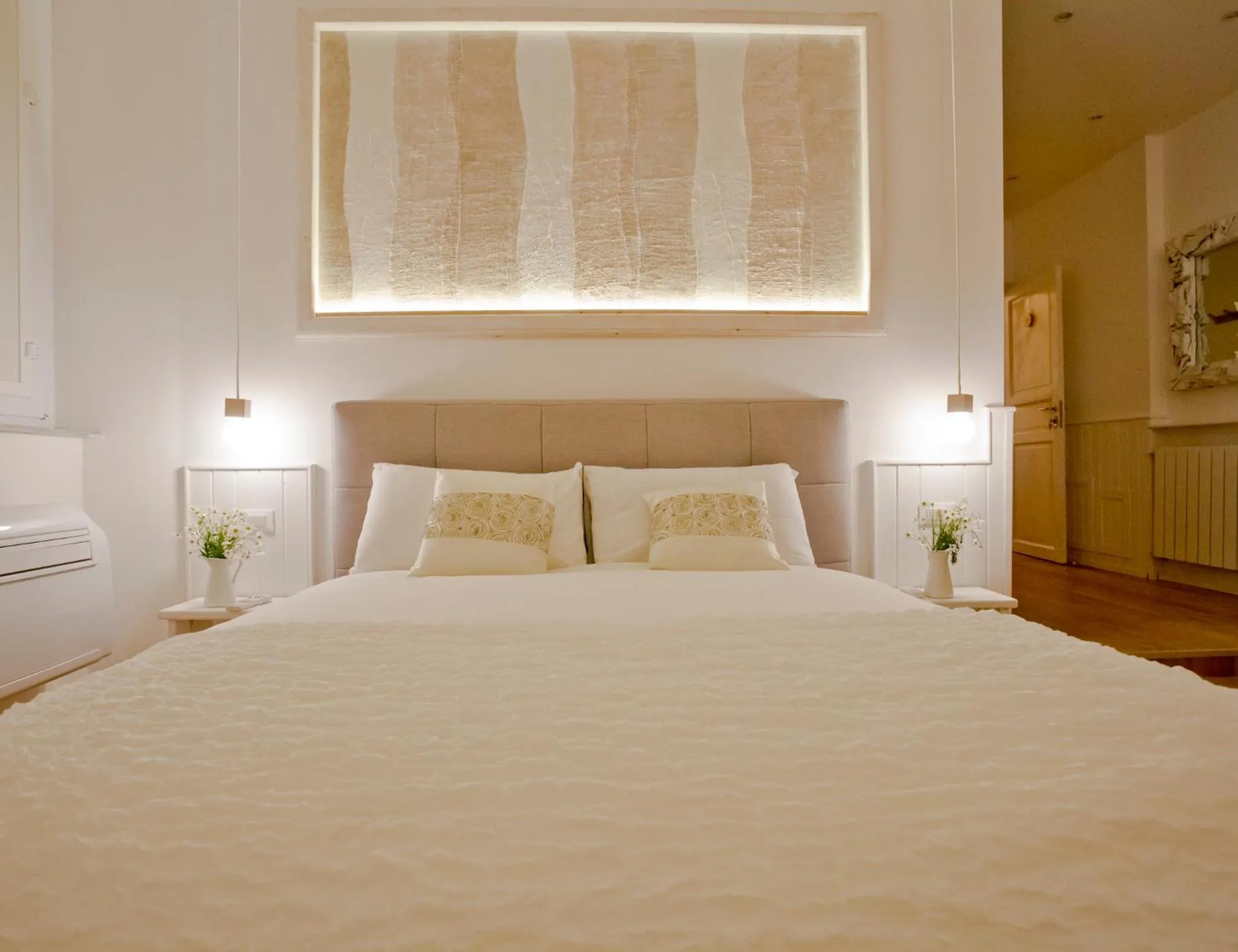 Bed in Primo Piano Suites