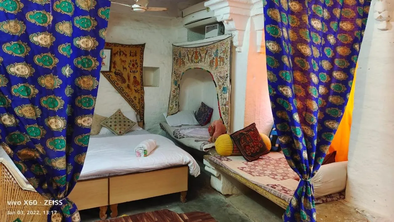 Bed in Shiva Guest House