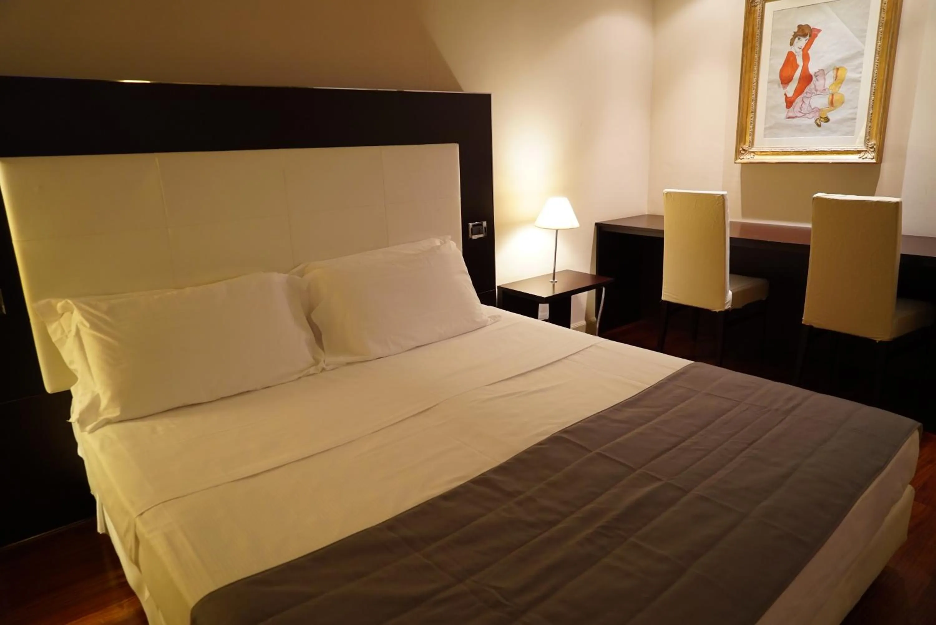 Bed in Cremona Palace Hotel