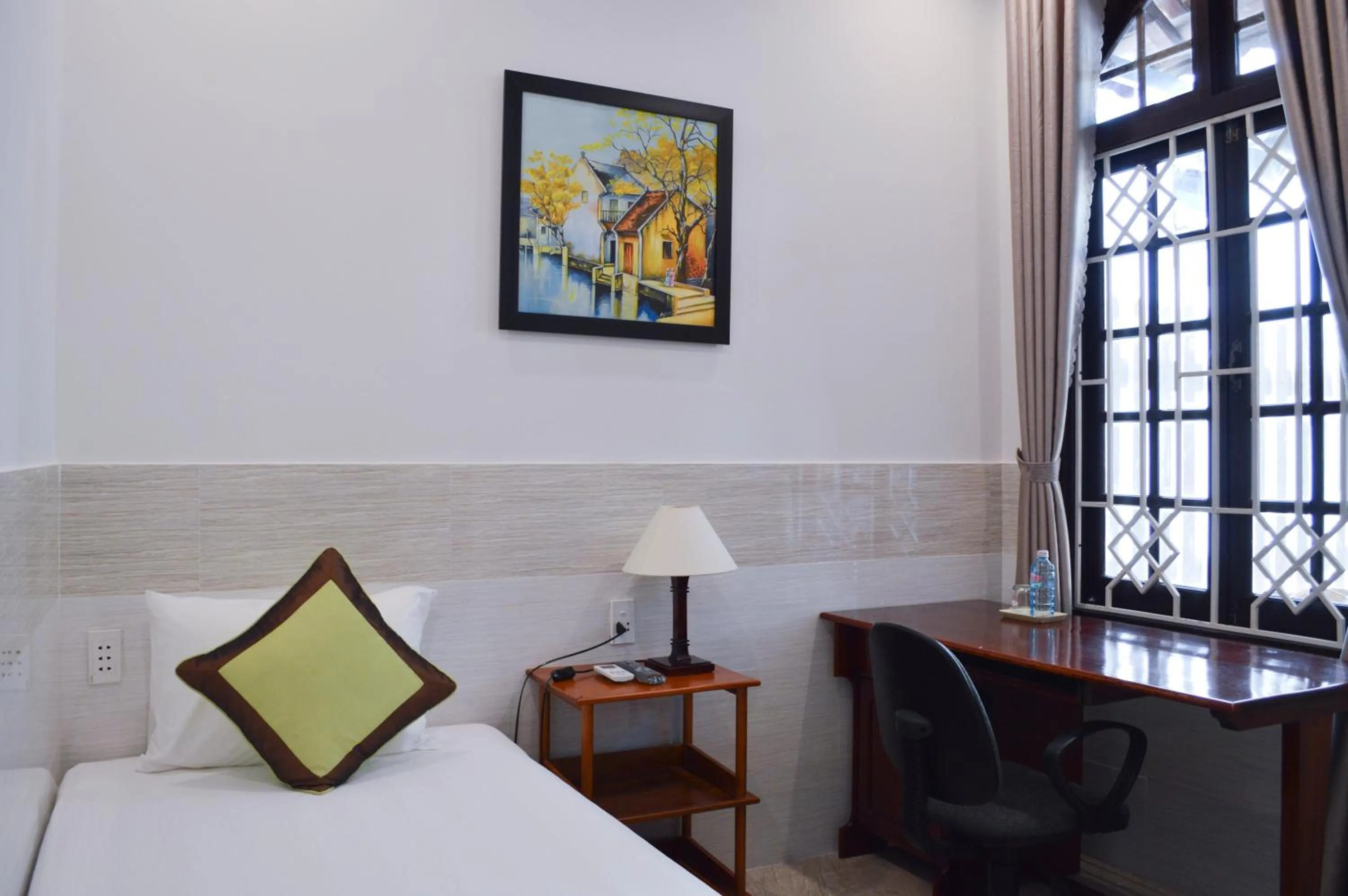 Bedroom, Seating Area in HaLo HomeStay