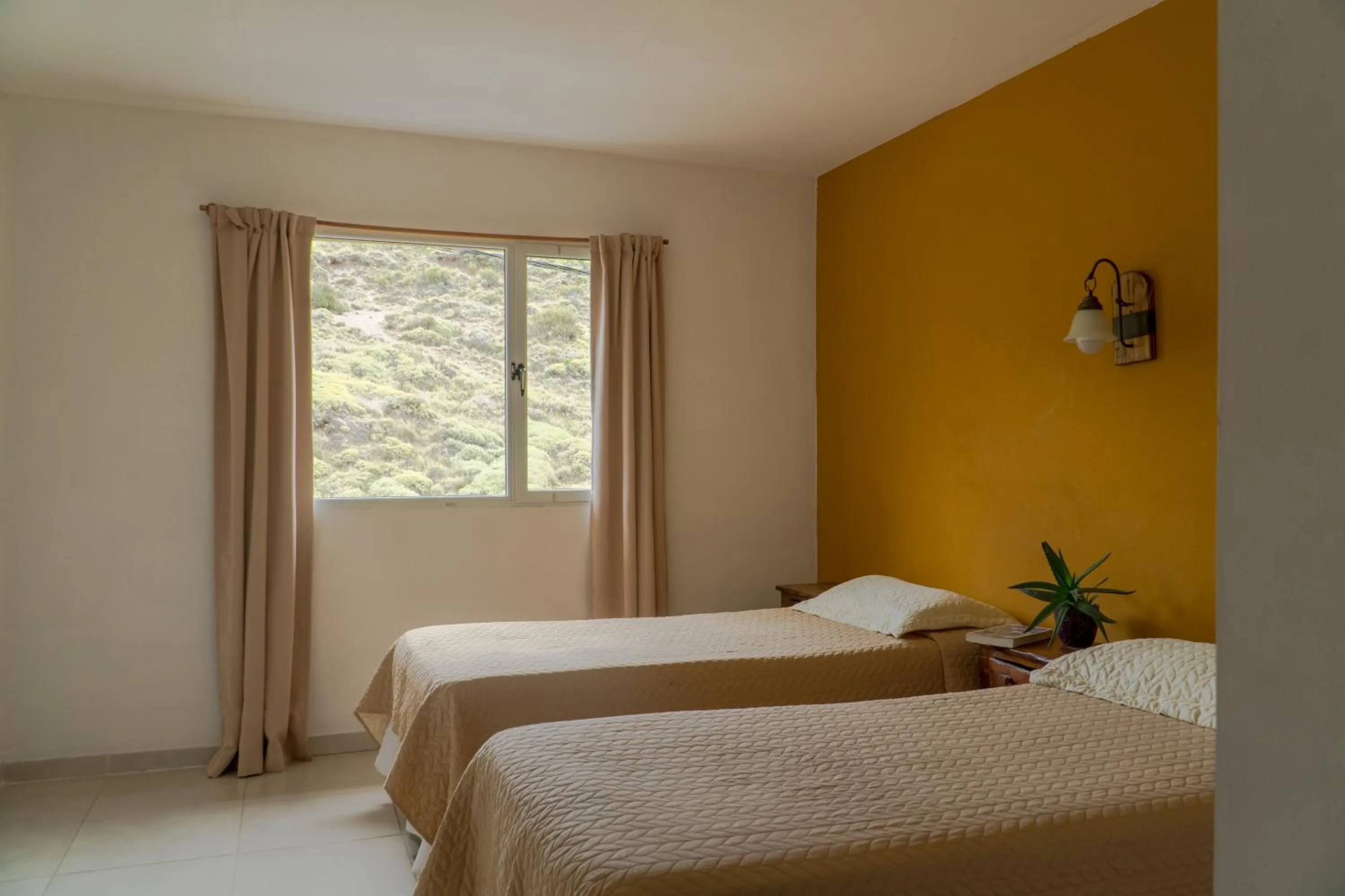 Photo of the whole room, Bed in Hosteria Alma de Patagonia