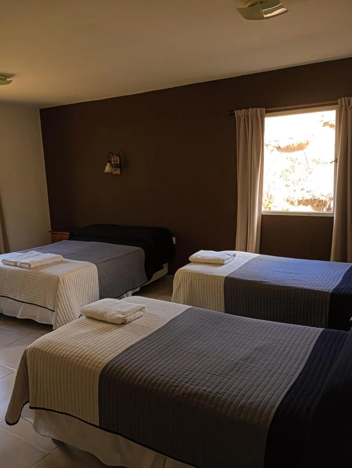 Photo of the whole room, Bed in Hosteria Alma de Patagonia