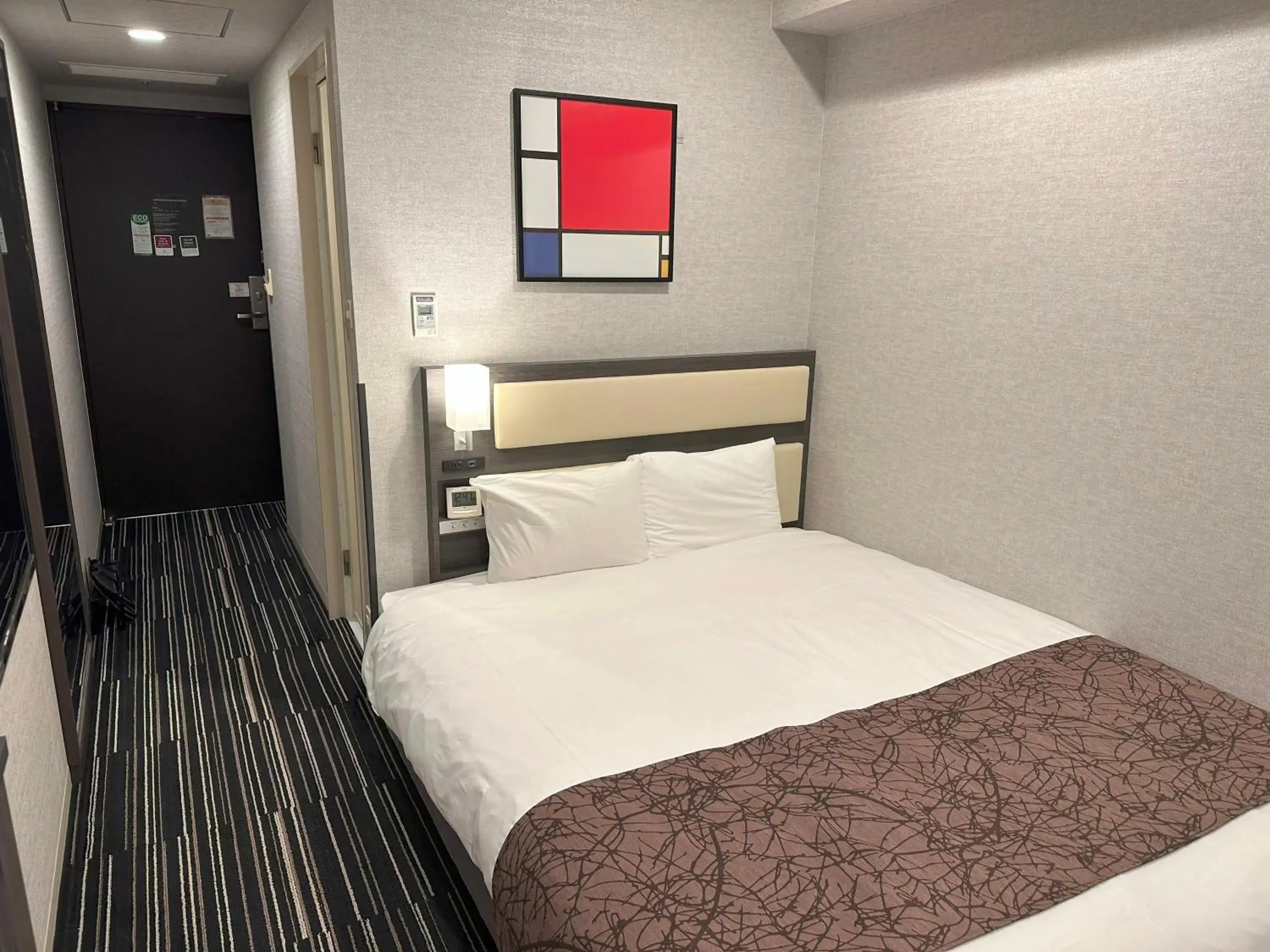 Bed in Hotel Sunroute Fukuchiyama Bed in Hotel Sunroute Fukuchiyama