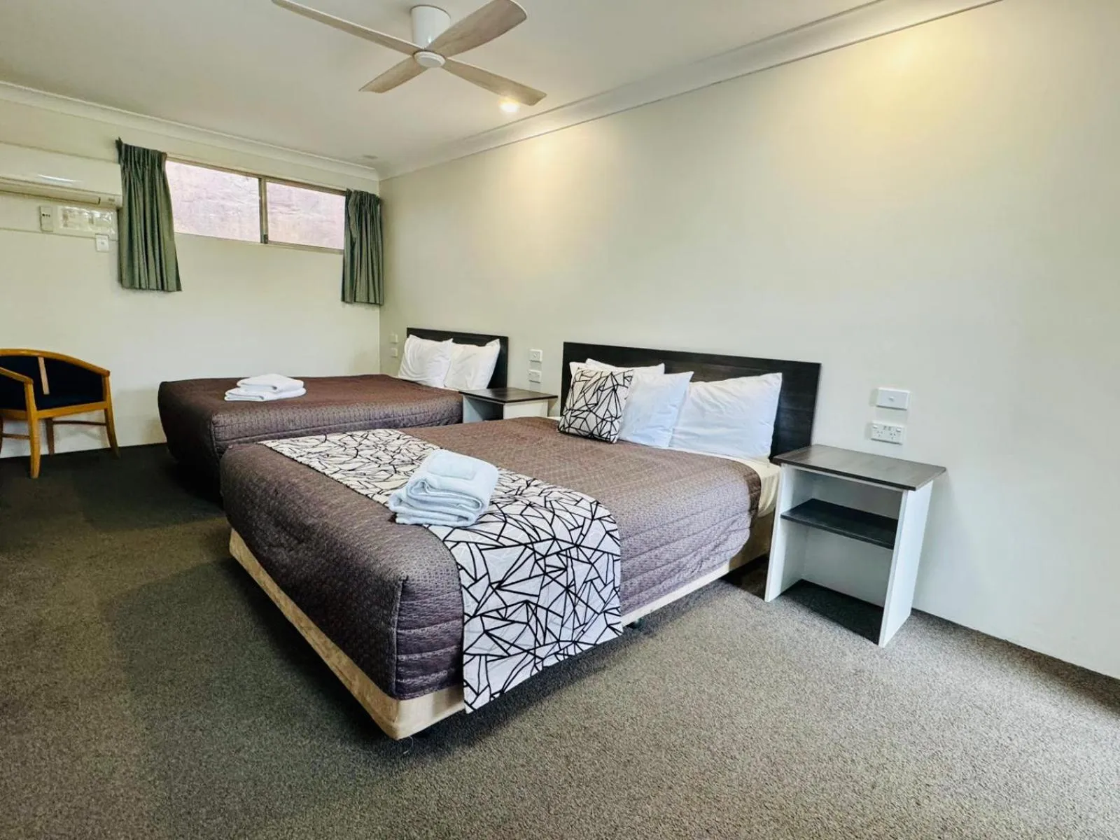 Bed in Ten Dollar Town Motel