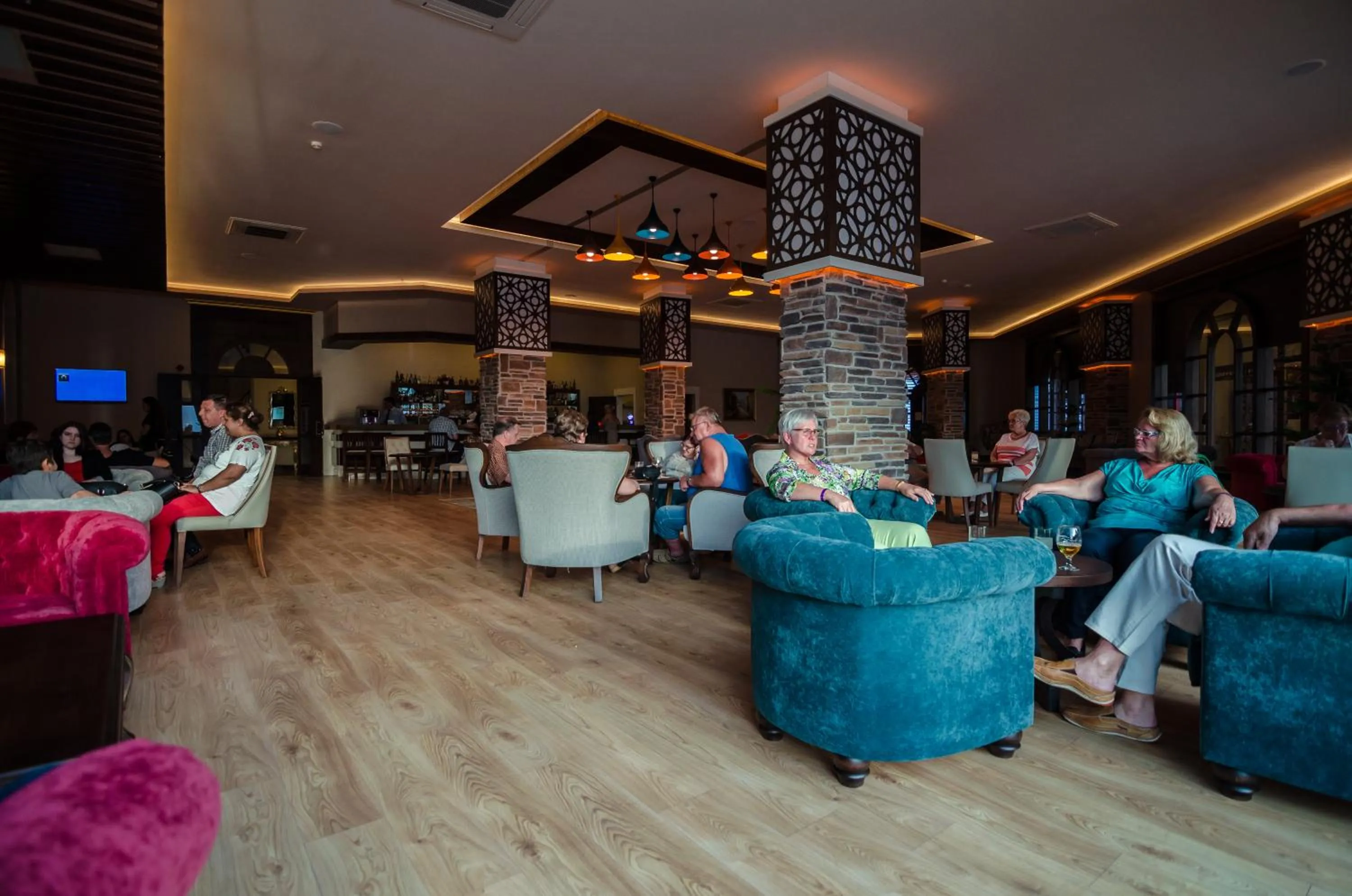 Communal lounge/ TV room in The Lumos Deluxe Resort Hotel & Spa