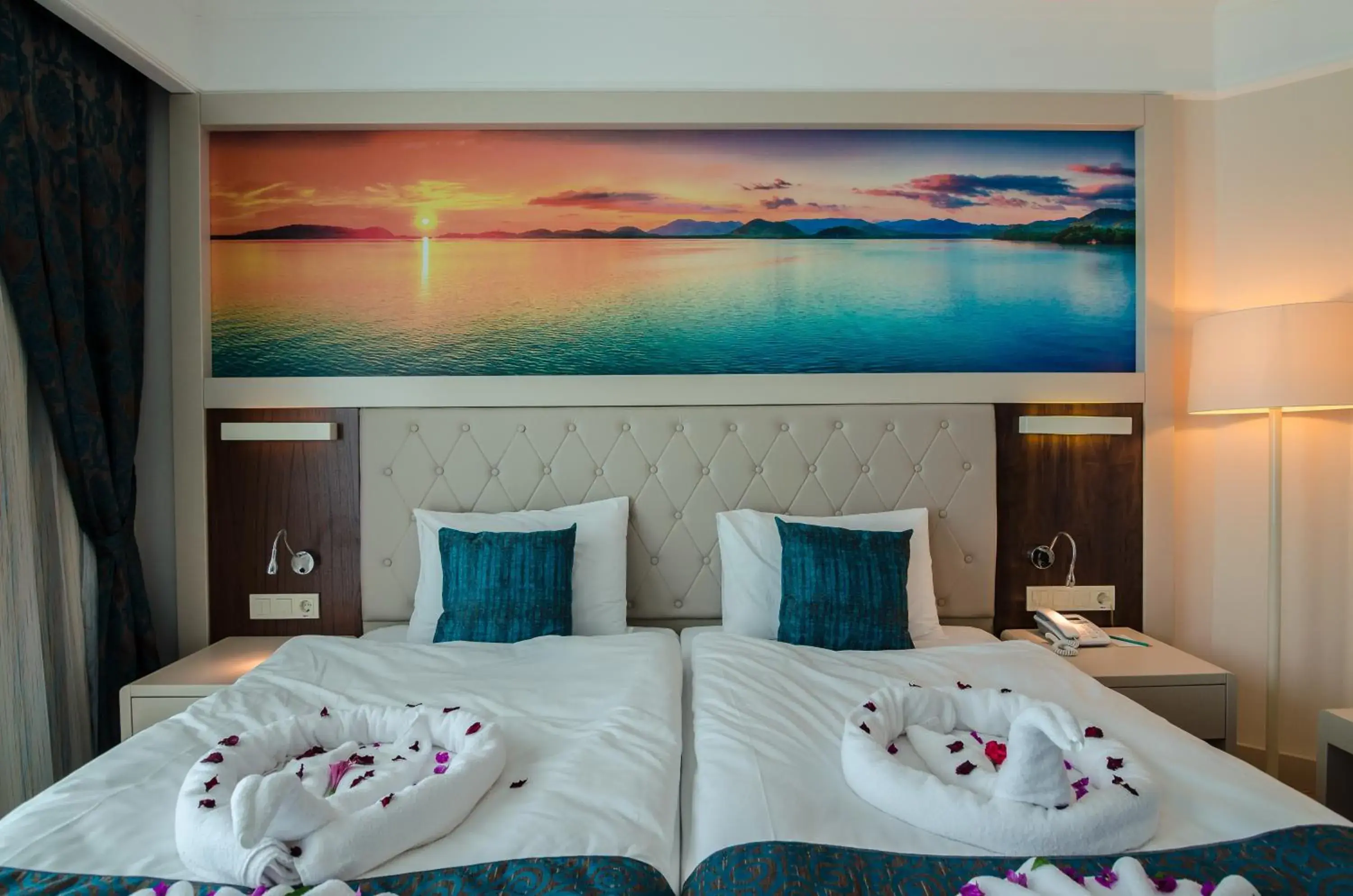 Bed in The Lumos Deluxe Resort Hotel & Spa Bed in The Lumos Deluxe Resort Hotel & Spa