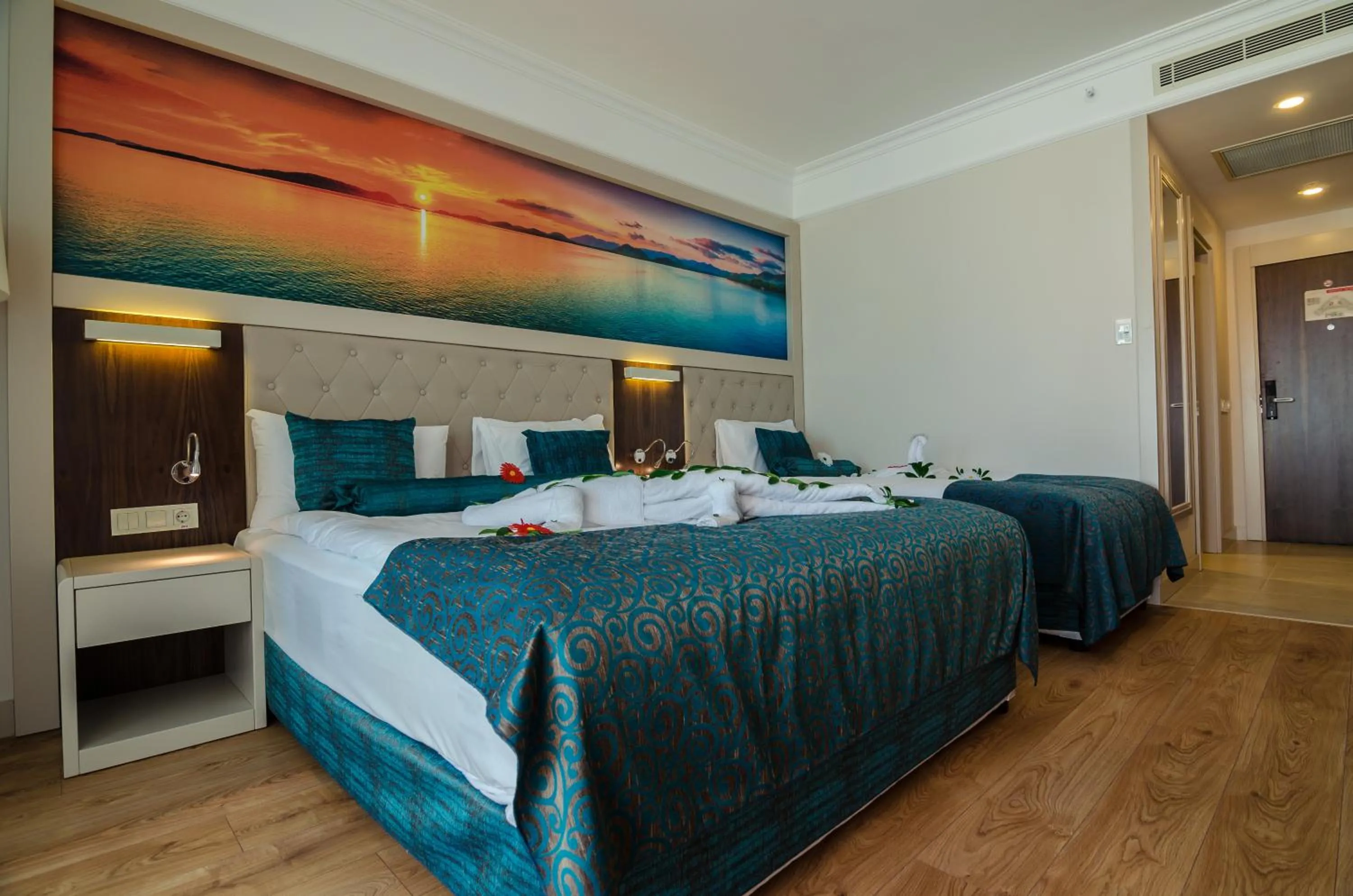 Bed in The Lumos Deluxe Resort Hotel & Spa