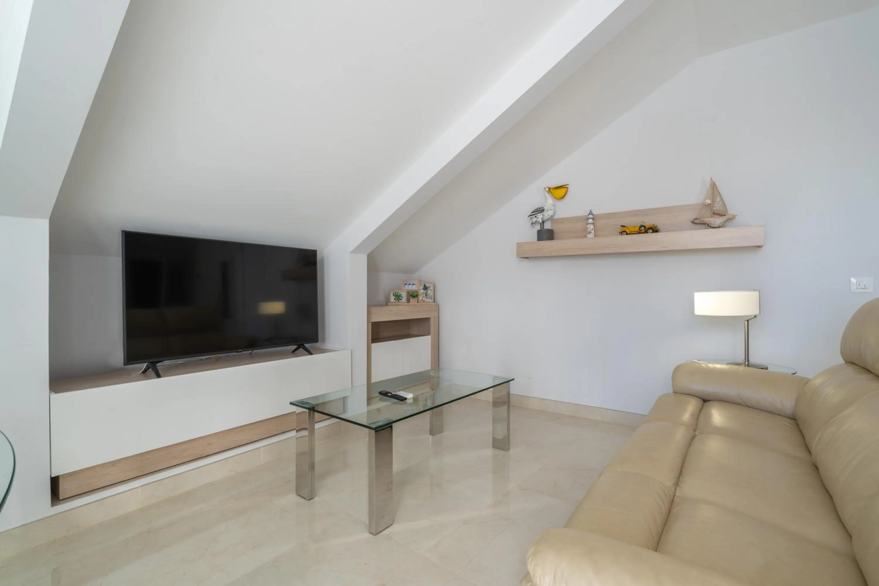 Living room in Apartamentos Castillo by Sur Suites