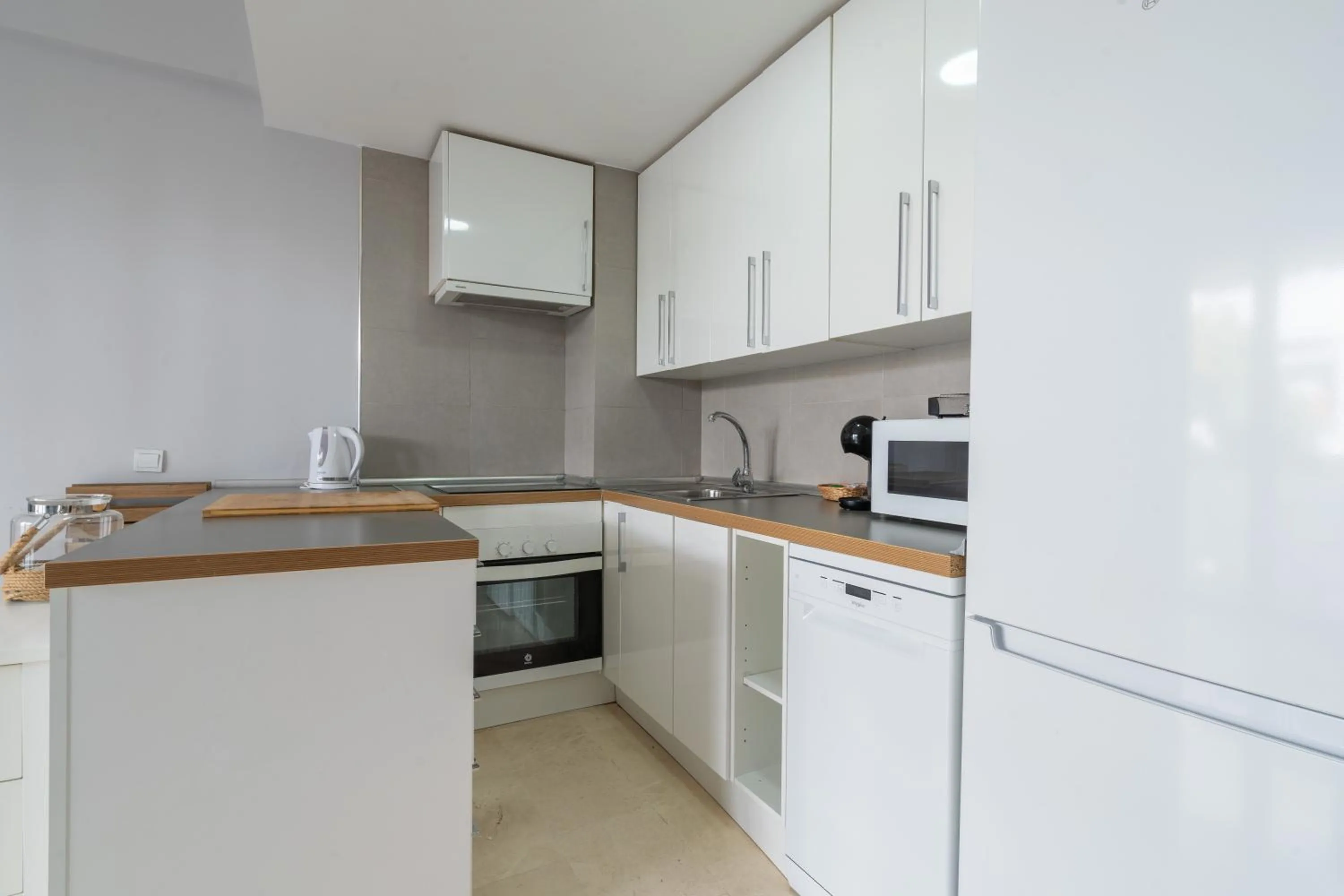 Kitchen or kitchenette in Apartamentos Castillo by Sur Suites