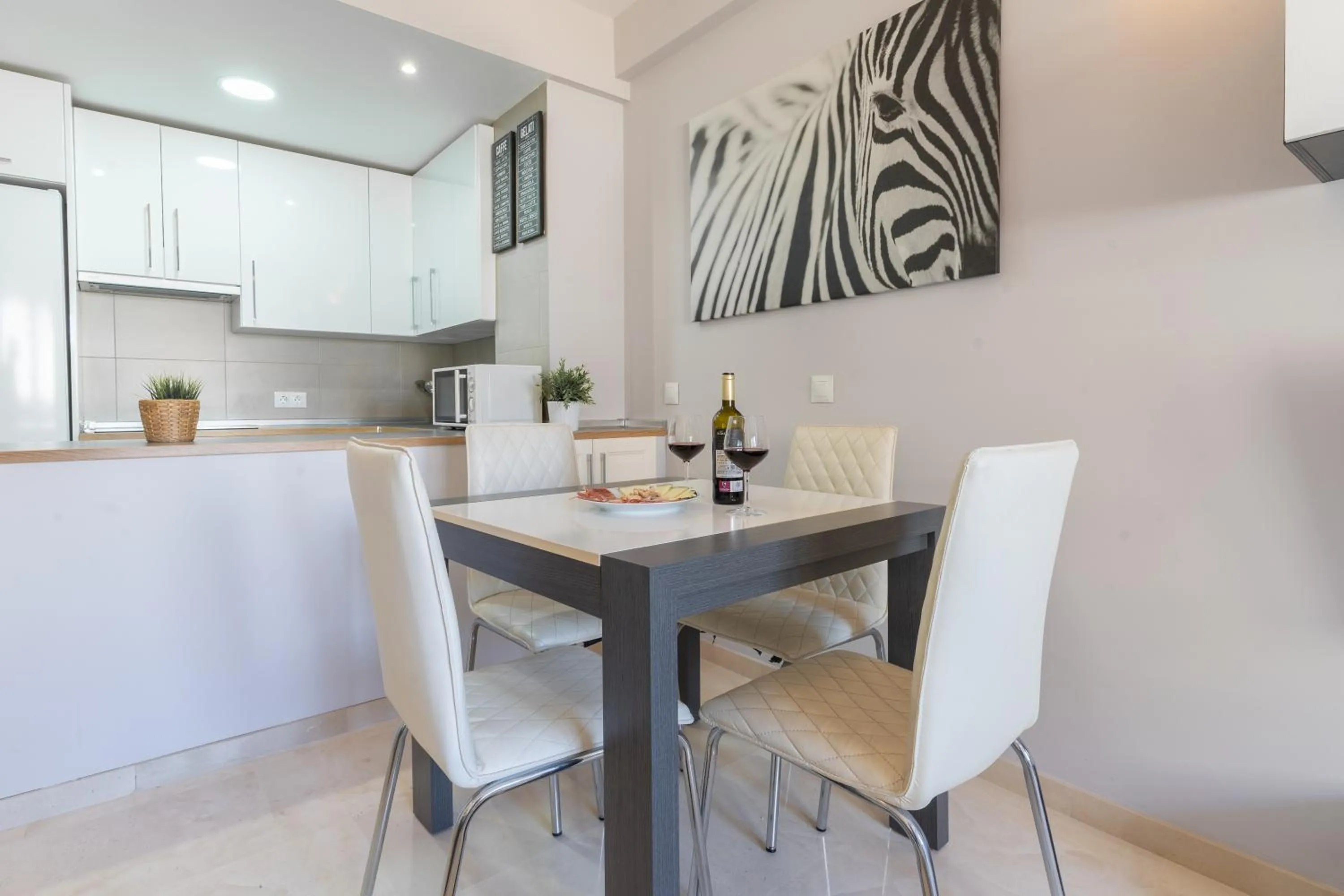 Dining area in Apartamentos Castillo by Sur Suites